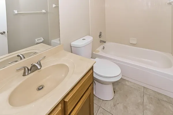 a bathroom with a toilet and a sink