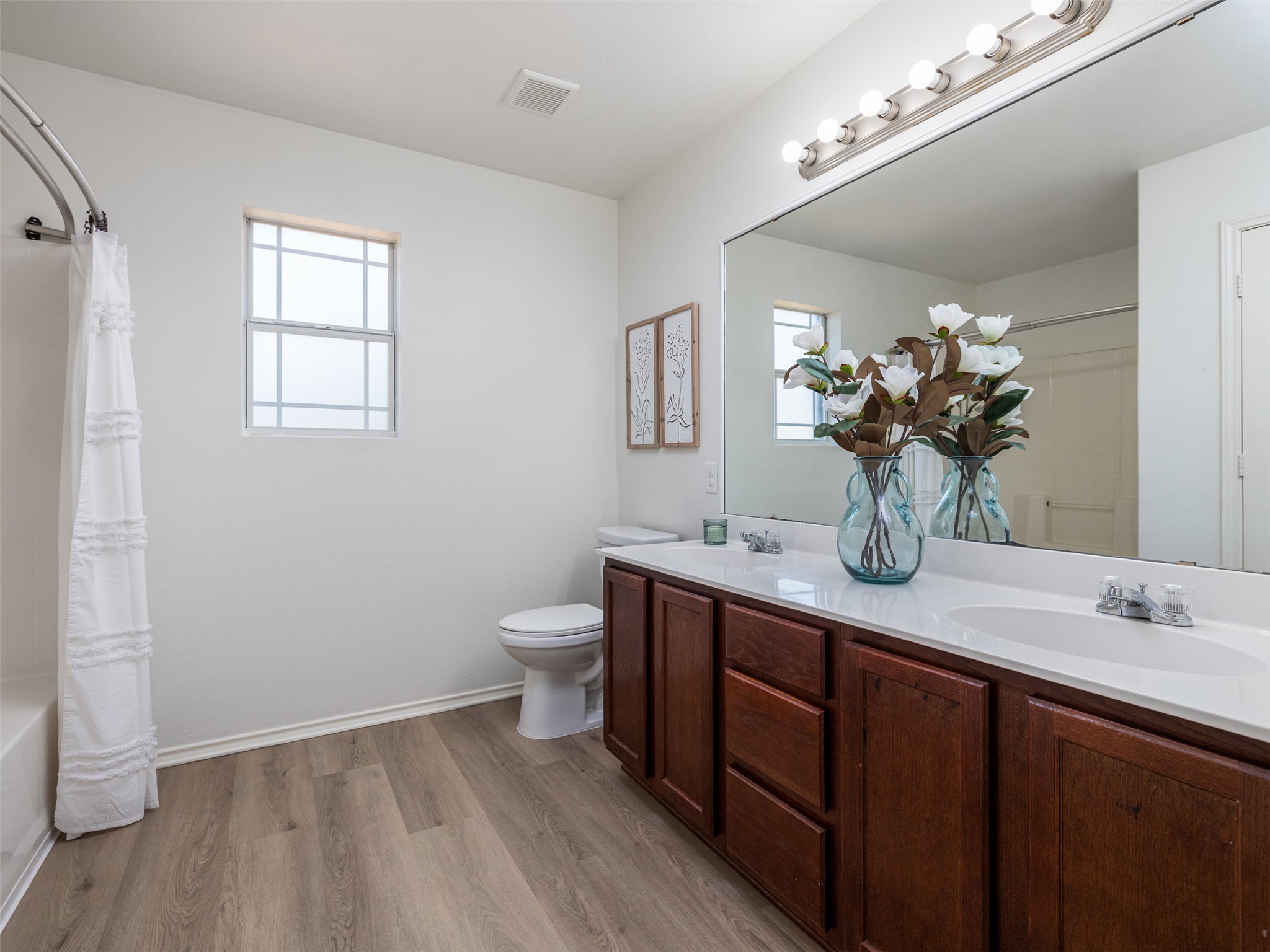 133 Lignite Drive Jarrell, TX 76537 - Photo 14 of 36 The primary bathroom is clean, bright, and move-in ready with quality fixtures and a functional layout that starts and ends your day right.
