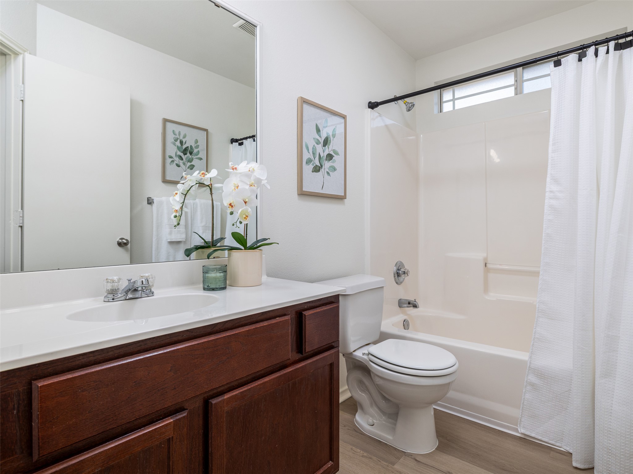 133 Lignite Drive Jarrell, TX 76537 - Photo 16 of 36 The secondary bathroom is well-maintained and move-in ready, with clean fixtures and bright lighting that serve the needs of family and guests with ease.