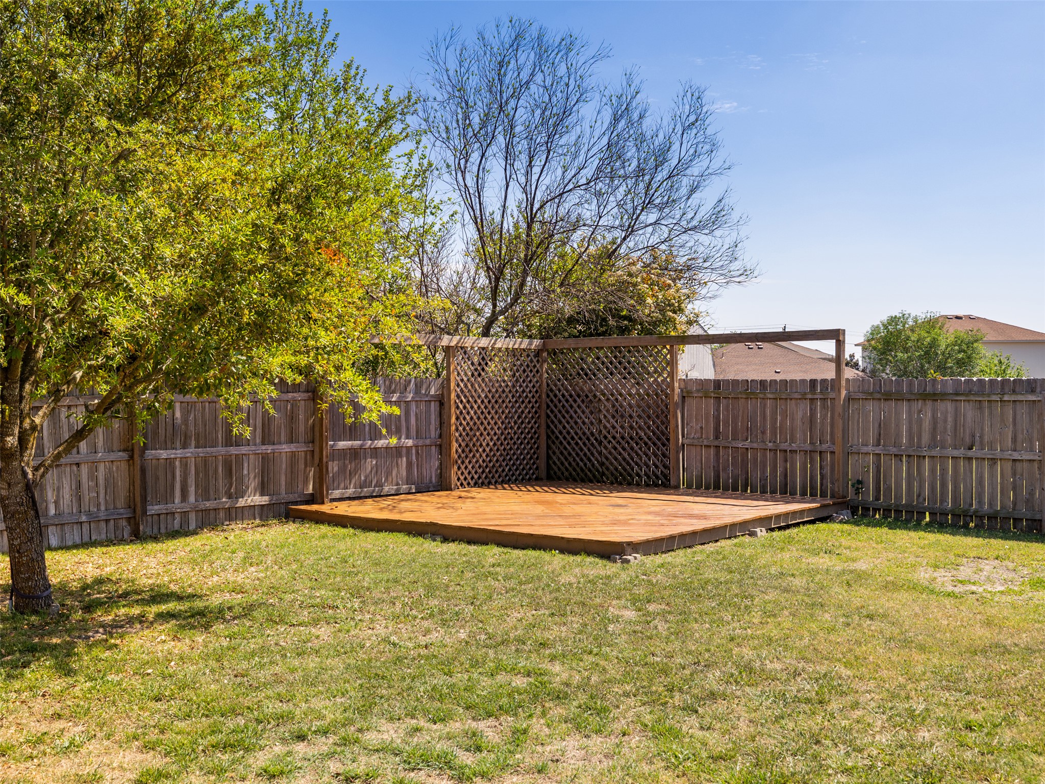 133 Lignite Drive Jarrell, TX 76537 - Photo 24 of 36 Tucked in the back corner of the yard, the built patio area is ready to become your go-to firepit and lounge spot for cool Texas evenings.