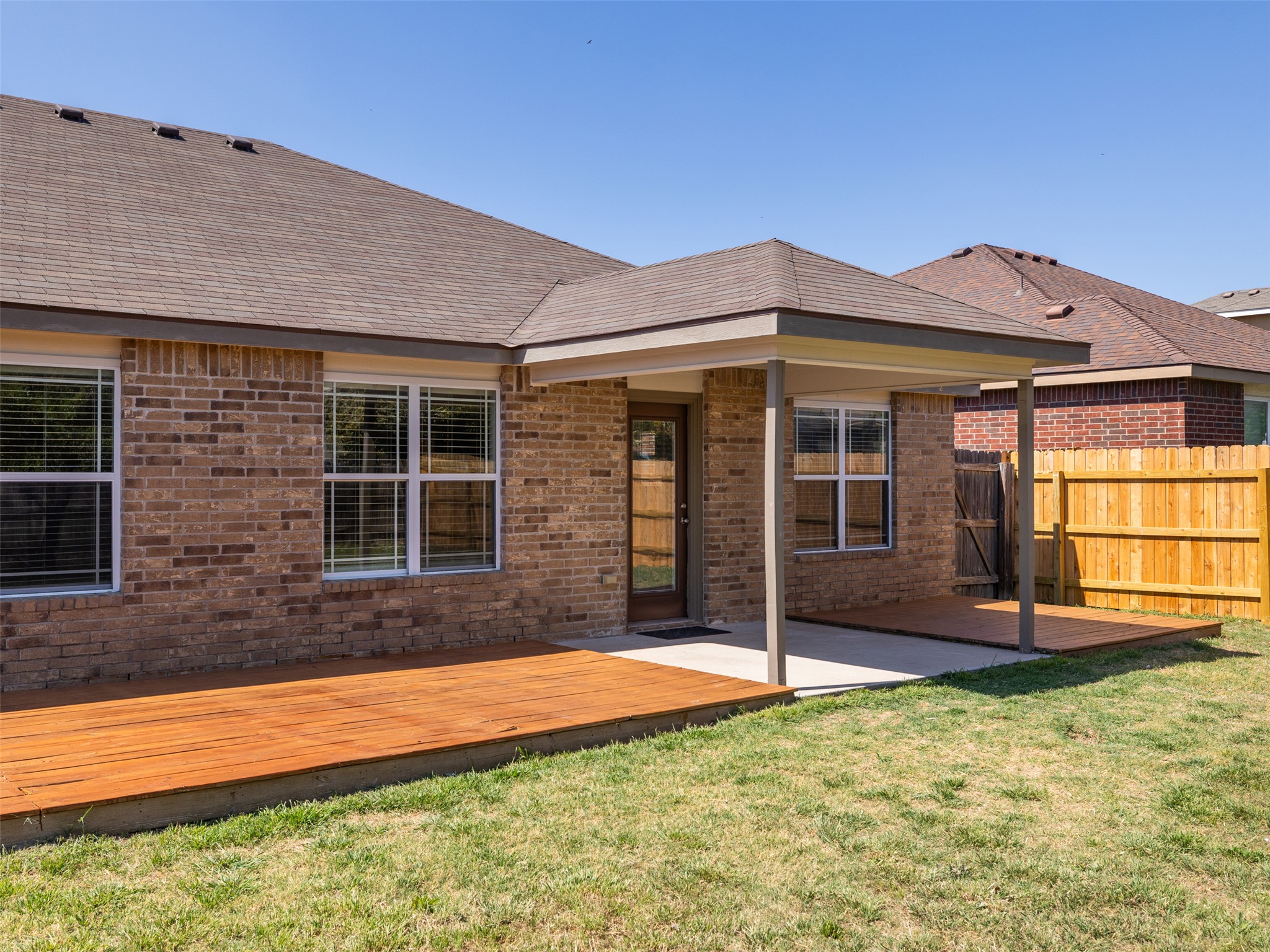 133 Lignite Drive Jarrell, TX 76537 - Photo 25 of 36 Enjoy the covered patio as an extension of your living space — ideal for outdoor dining, entertaining, or just relaxing with friends and family.