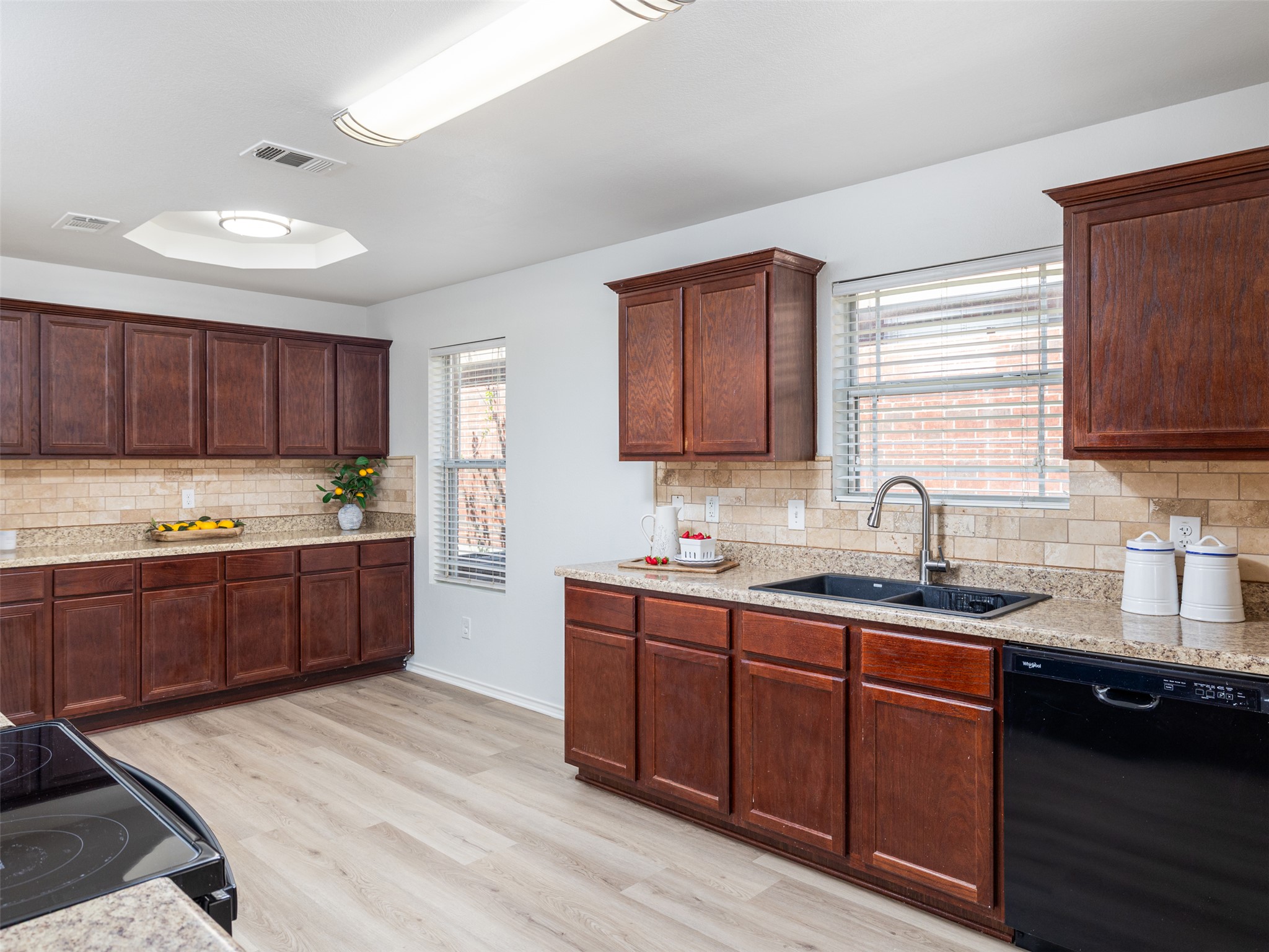 133 Lignite Drive Jarrell, TX 76537 - Photo 7 of 36 The kitchen features ample cabinetry and generous counter space, giving you everything you need for everyday cooking and meal prep.