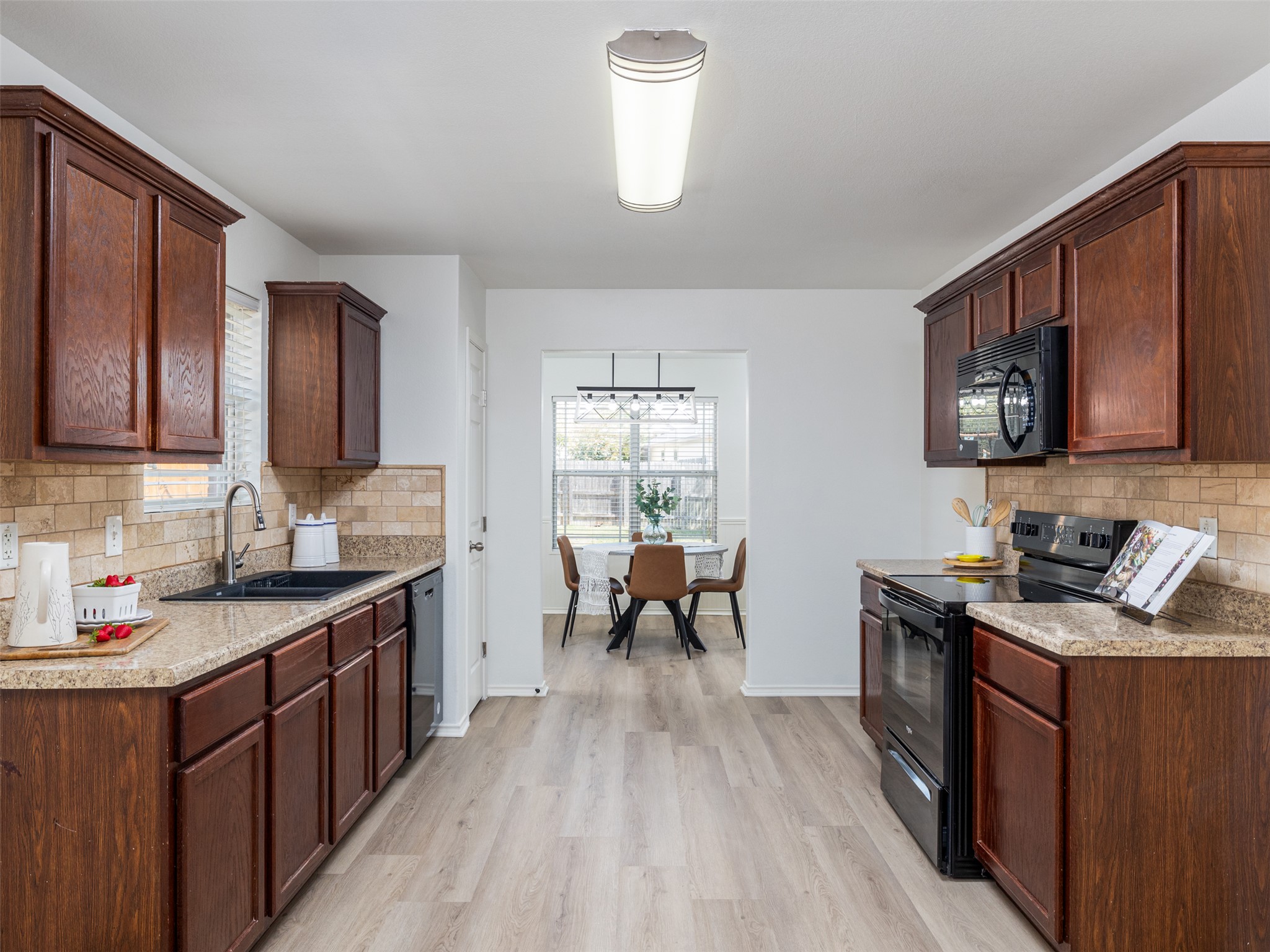 133 Lignite Drive Jarrell, TX 76537 - Photo 10 of 36 Plenty of counter space makes this kitchen as functional as it is attractive, with room to spread out whether you're cooking for two or entertaining a crowd.