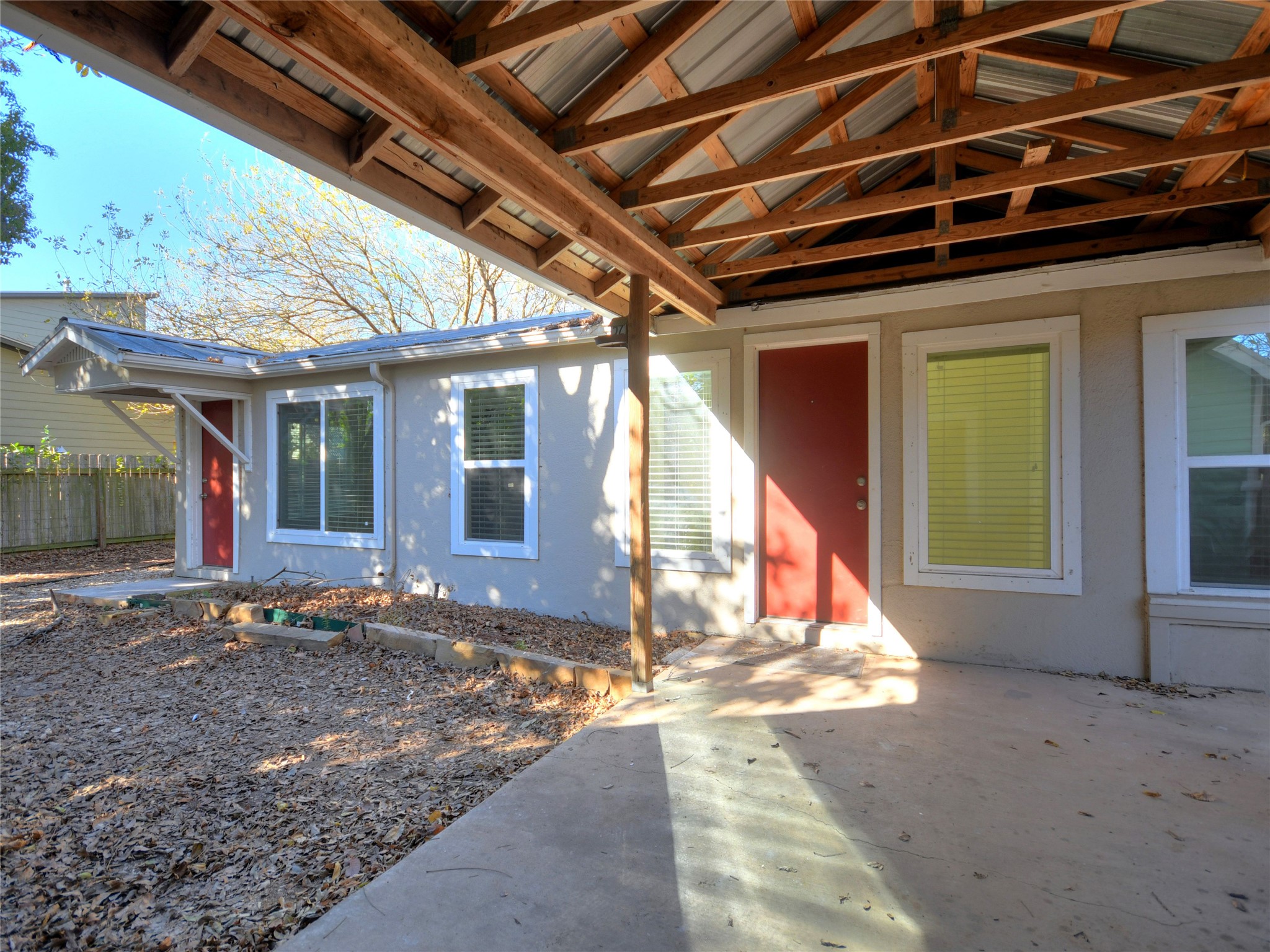 4604 Red River Street, Unit B Austin, TX 78751 - Photo 2 of 15 A welcoming covered patio provides ample space for outdoor relaxation and entertaining.