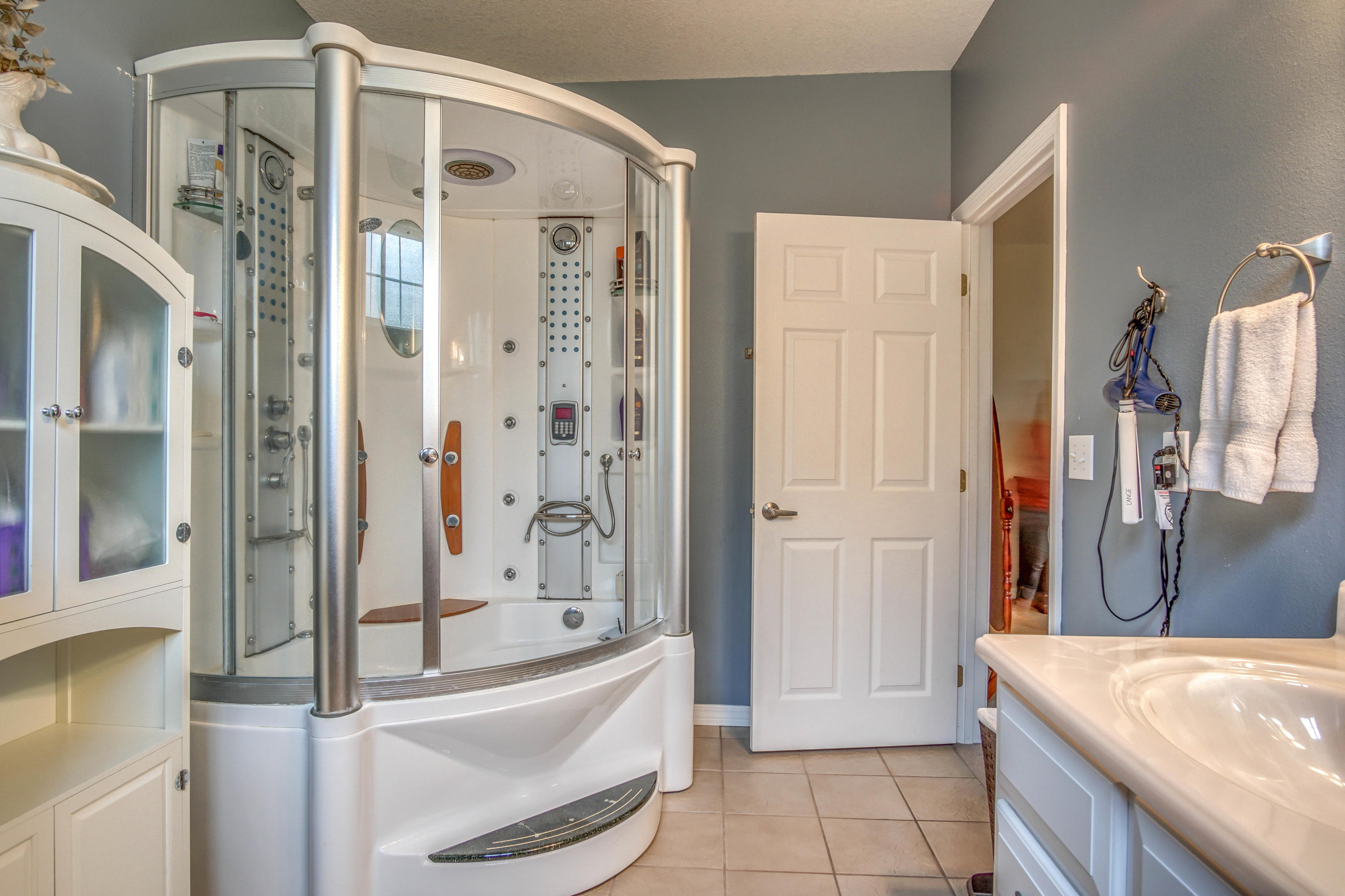 3110 Bay Ridge Drive Crestview, FL 32539 - Photo 14 of 31 a bathroom with a tub a sink and a shower