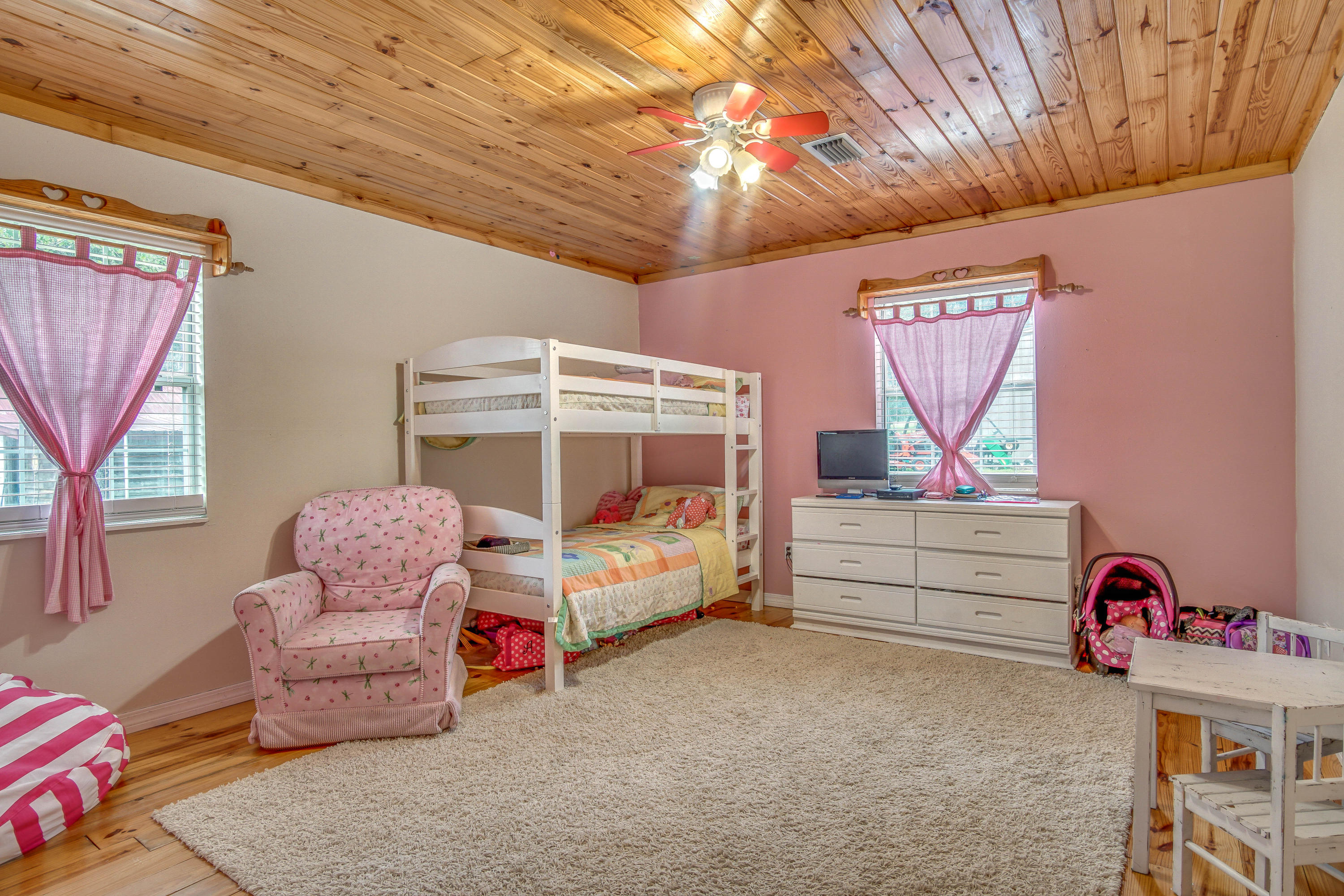 3110 Bay Ridge Drive Crestview, FL 32539 - Photo 22 of 31 a bedroom with furniture and a window