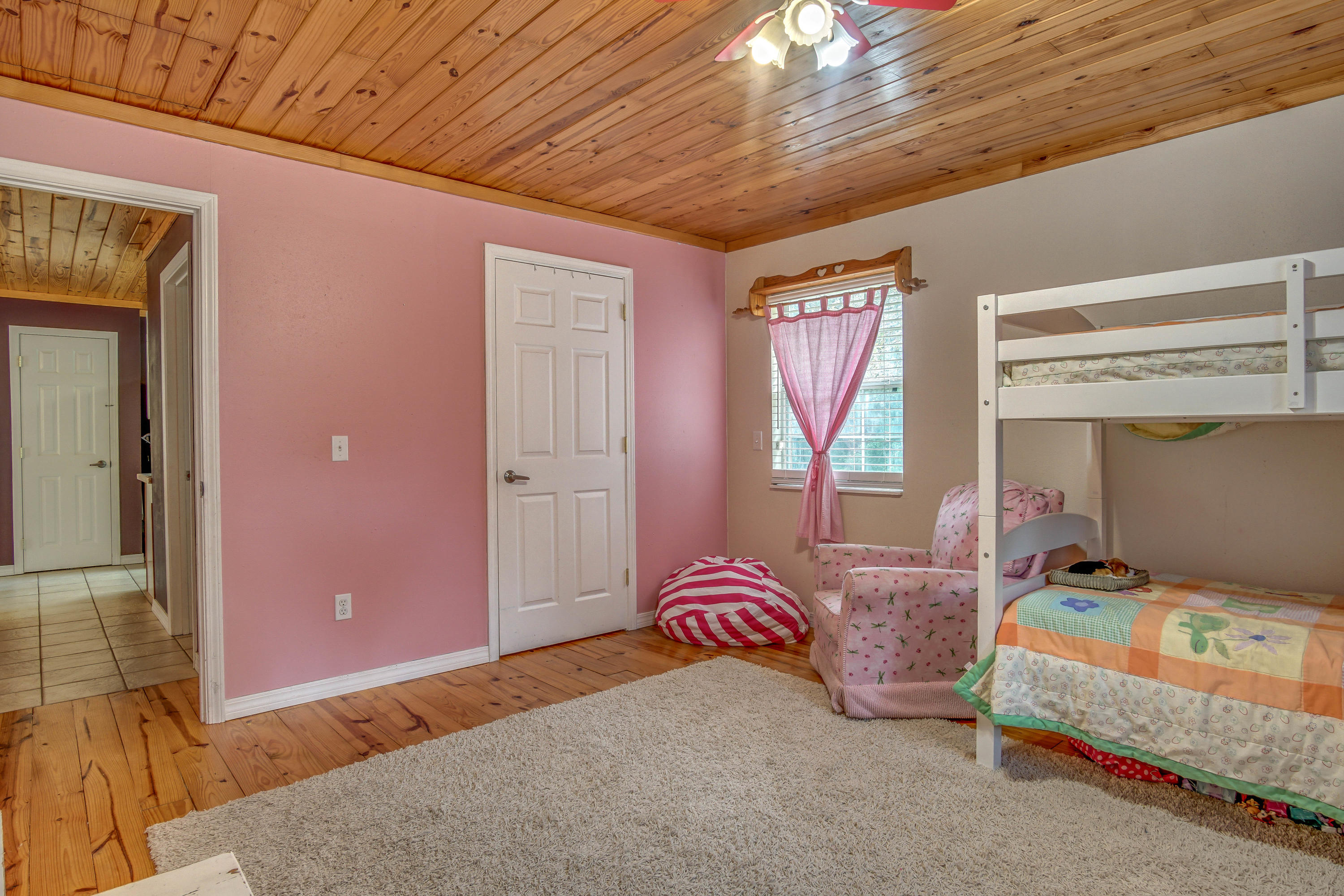3110 Bay Ridge Drive Crestview, FL 32539 - Photo 23 of 31 a bedroom with a bed and a window