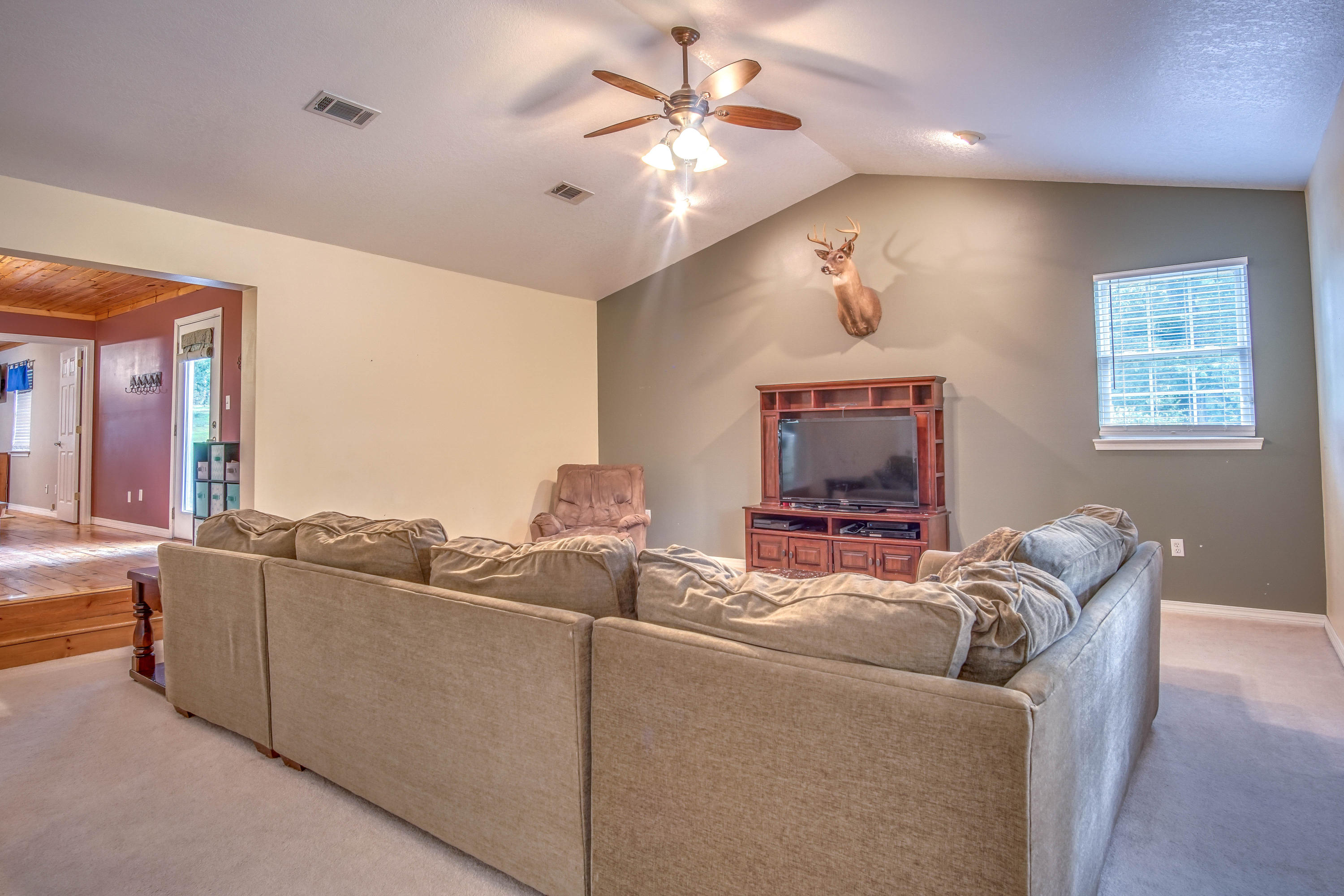 3110 Bay Ridge Drive Crestview, FL 32539 - Photo 6 of 31 a living room with furniture and a window
