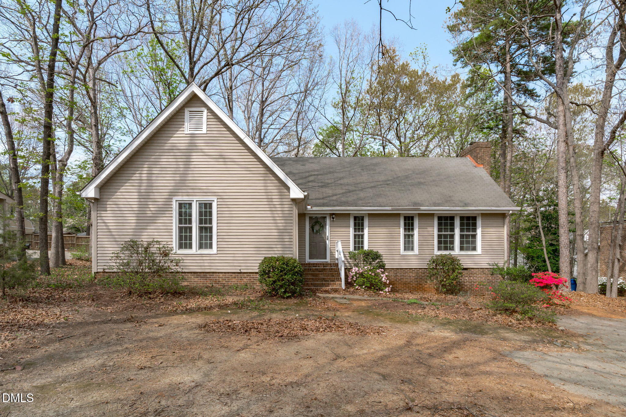 3304 Wade Avenue Raleigh, NC 27607 - Photo 2 of 38 a view of house with a yard and potted plants