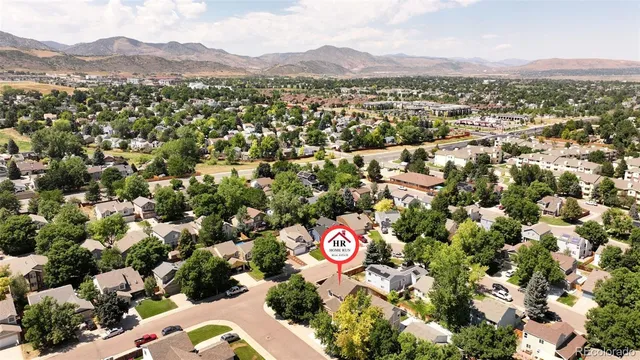 a view of a city with mountains in the background