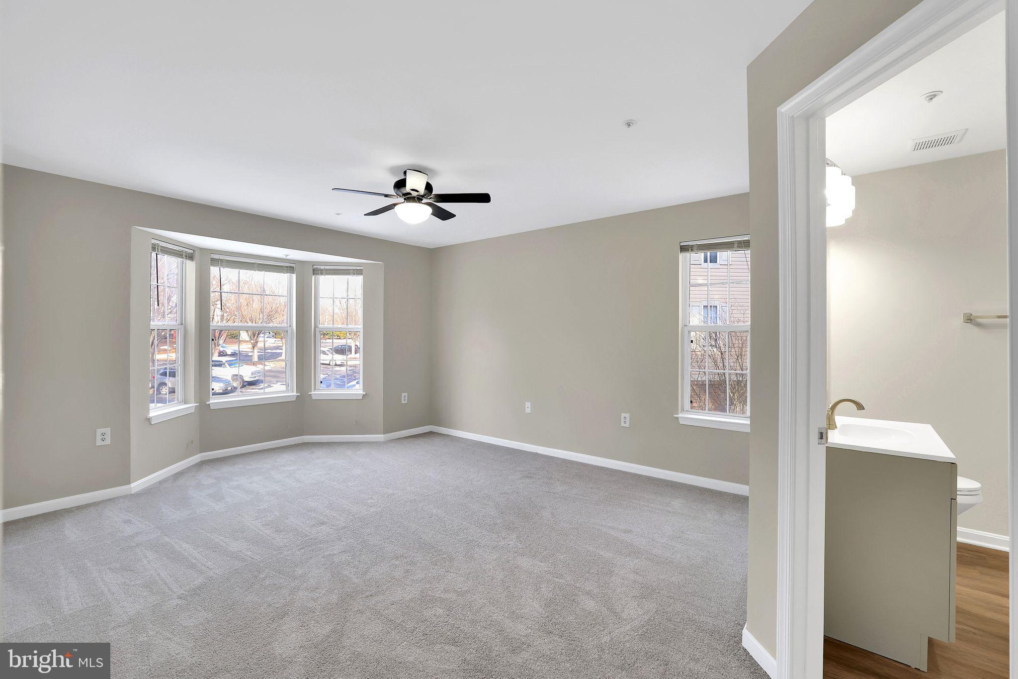 9808 Lake Pointe, Unit 201 Upper Marlboro, MD 20774 - Photo 15 of 25 a view of an empty room with a window