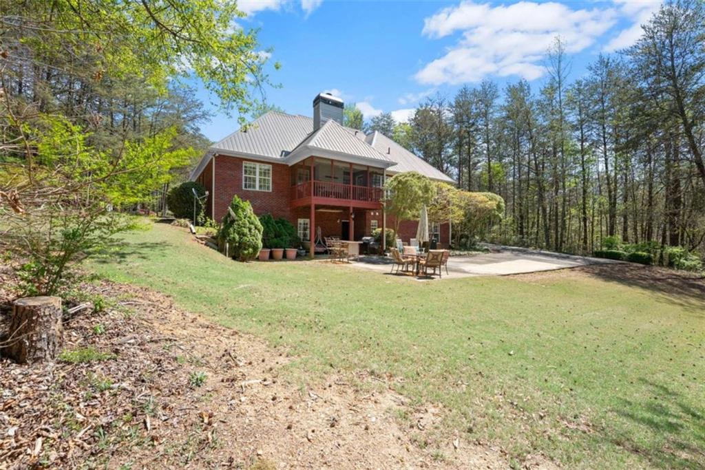 219 John Garner Road Dahlonega, GA 30533 - Photo 58 of 76 a view of a house with a yard