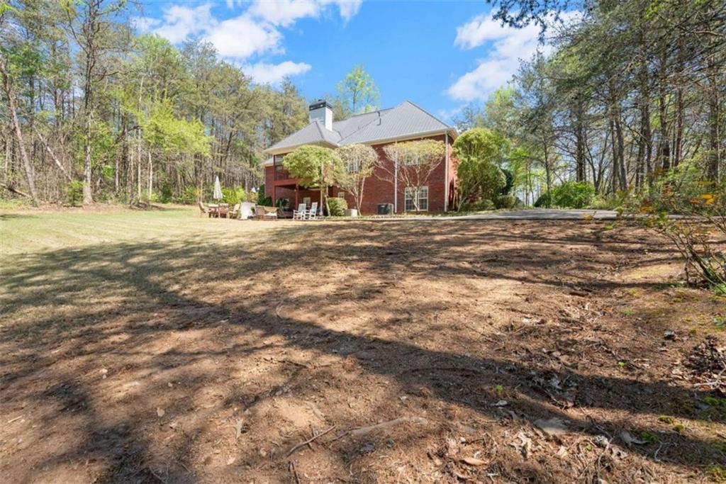 219 John Garner Road Dahlonega, GA 30533 - Photo 60 of 76 a view of a street with houses