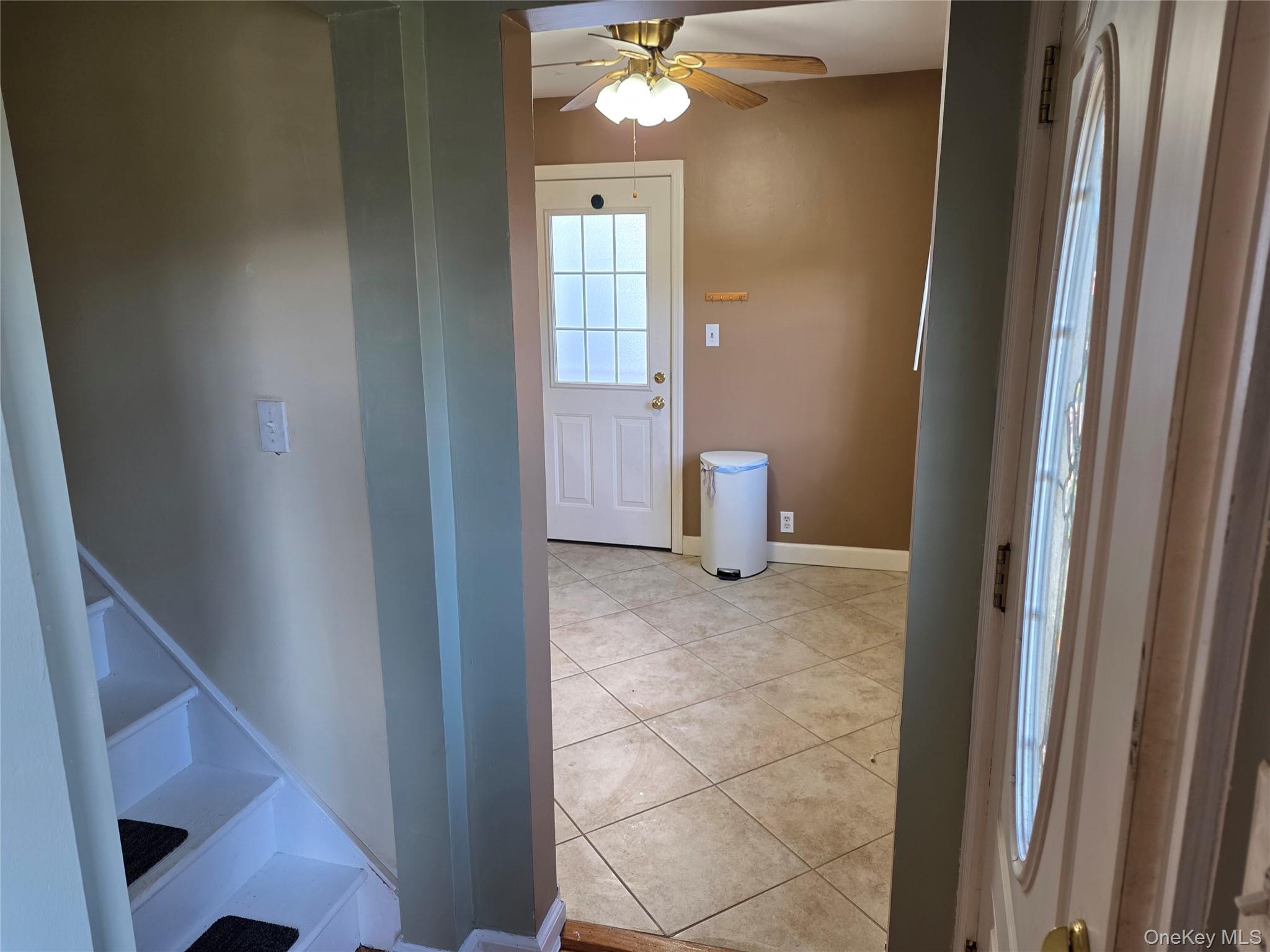 220 Raff Avenue Mineola, NY 11501 - Photo 14 of 22 Hall featuring light tile patterned floors and baseboards