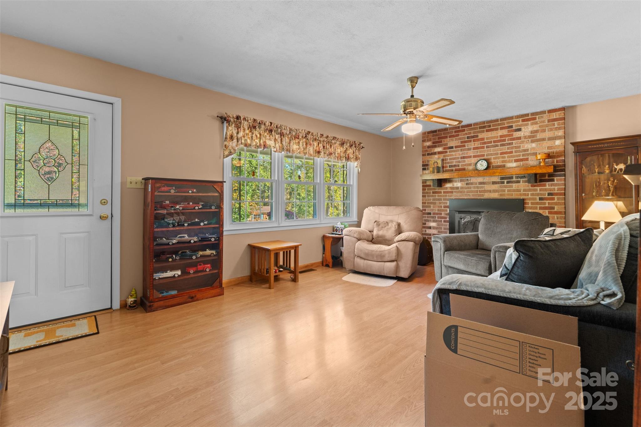2598 Conner Circle Lenoir, NC 28645 - Photo 14 of 44 a living room with furniture and a fireplace