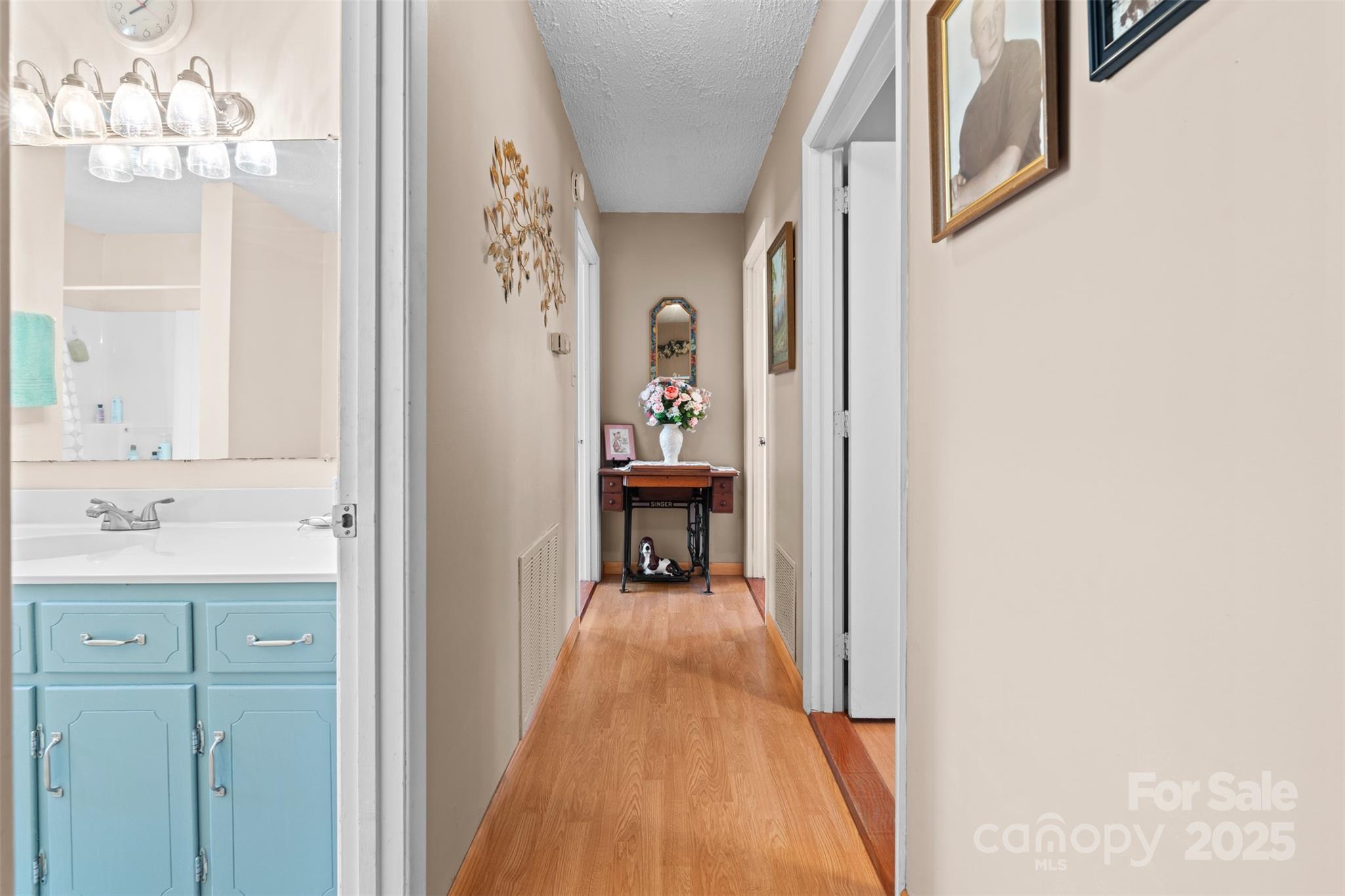 2598 Conner Circle Lenoir, NC 28645 - Photo 16 of 44 a view of a hallway view with wooden floor and staircase