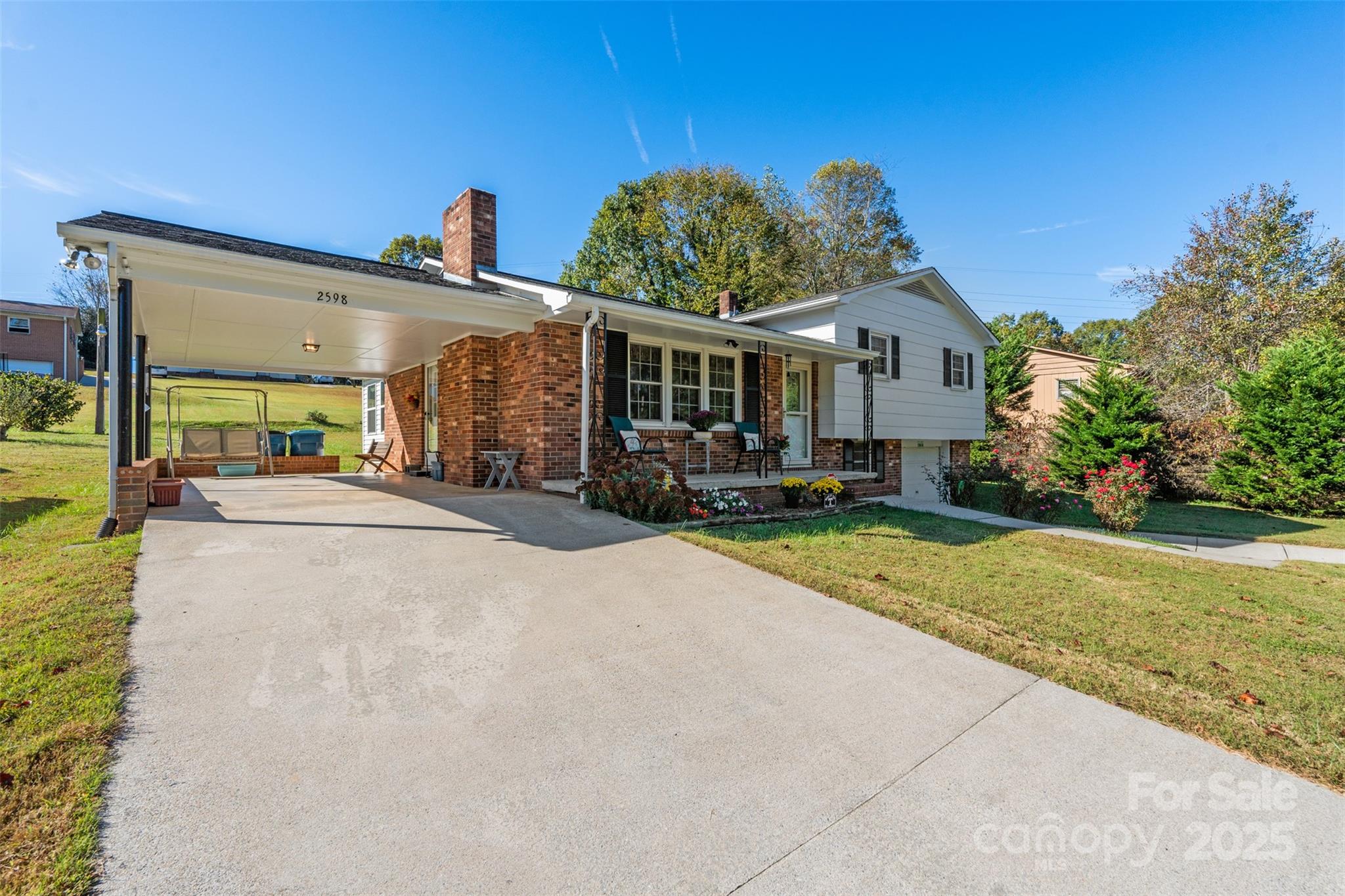 2598 Conner Circle Lenoir, NC 28645 - Photo 2 of 44 a front view of a house with porch