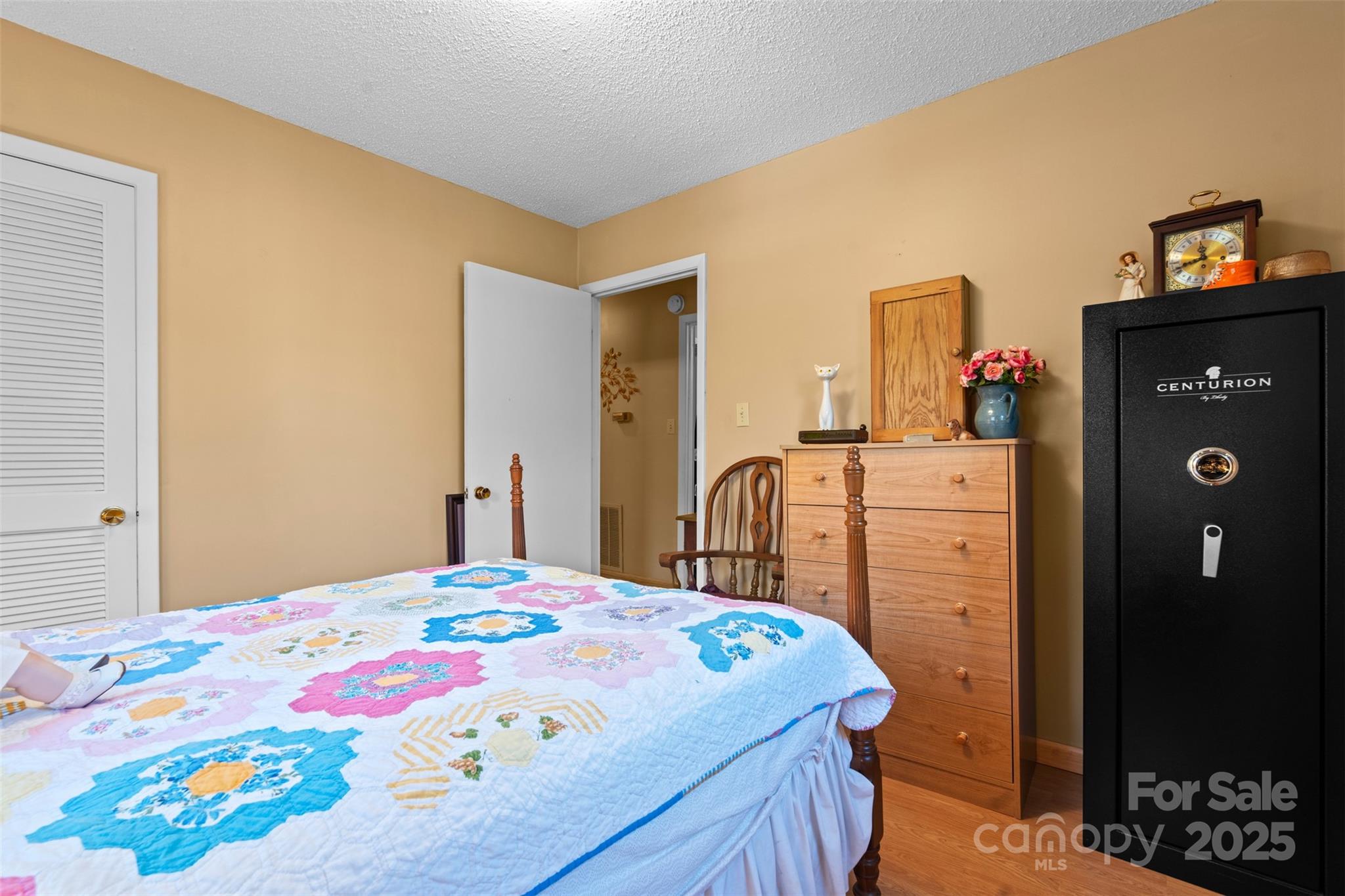 2598 Conner Circle Lenoir, NC 28645 - Photo 21 of 44 a bedroom with a bed and a dresser