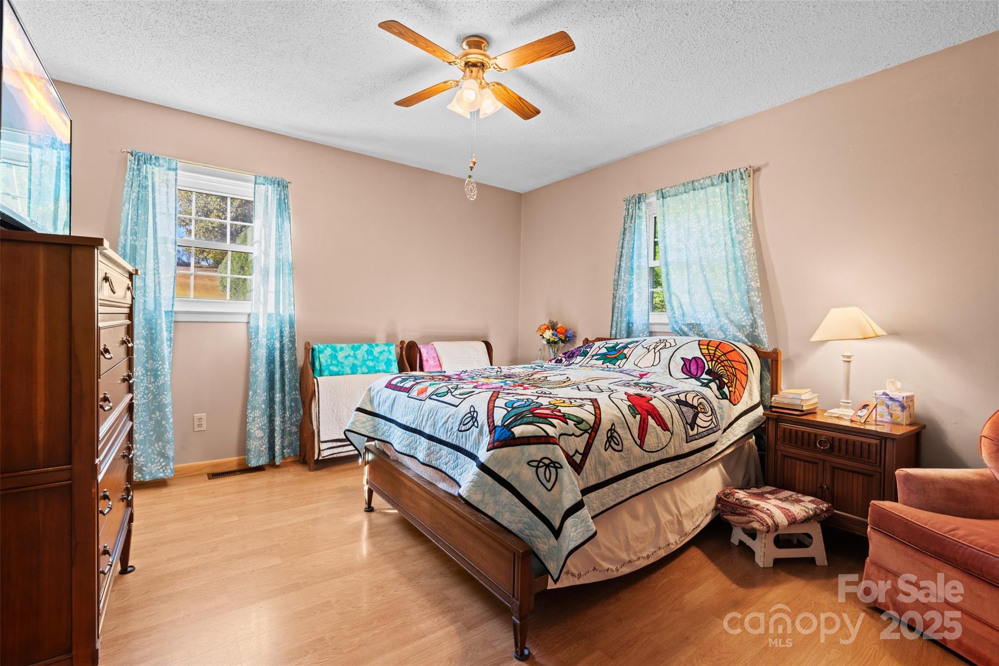 2598 Conner Circle Lenoir, NC 28645 - Photo 22 of 44 a bedroom with a bed couch and a window