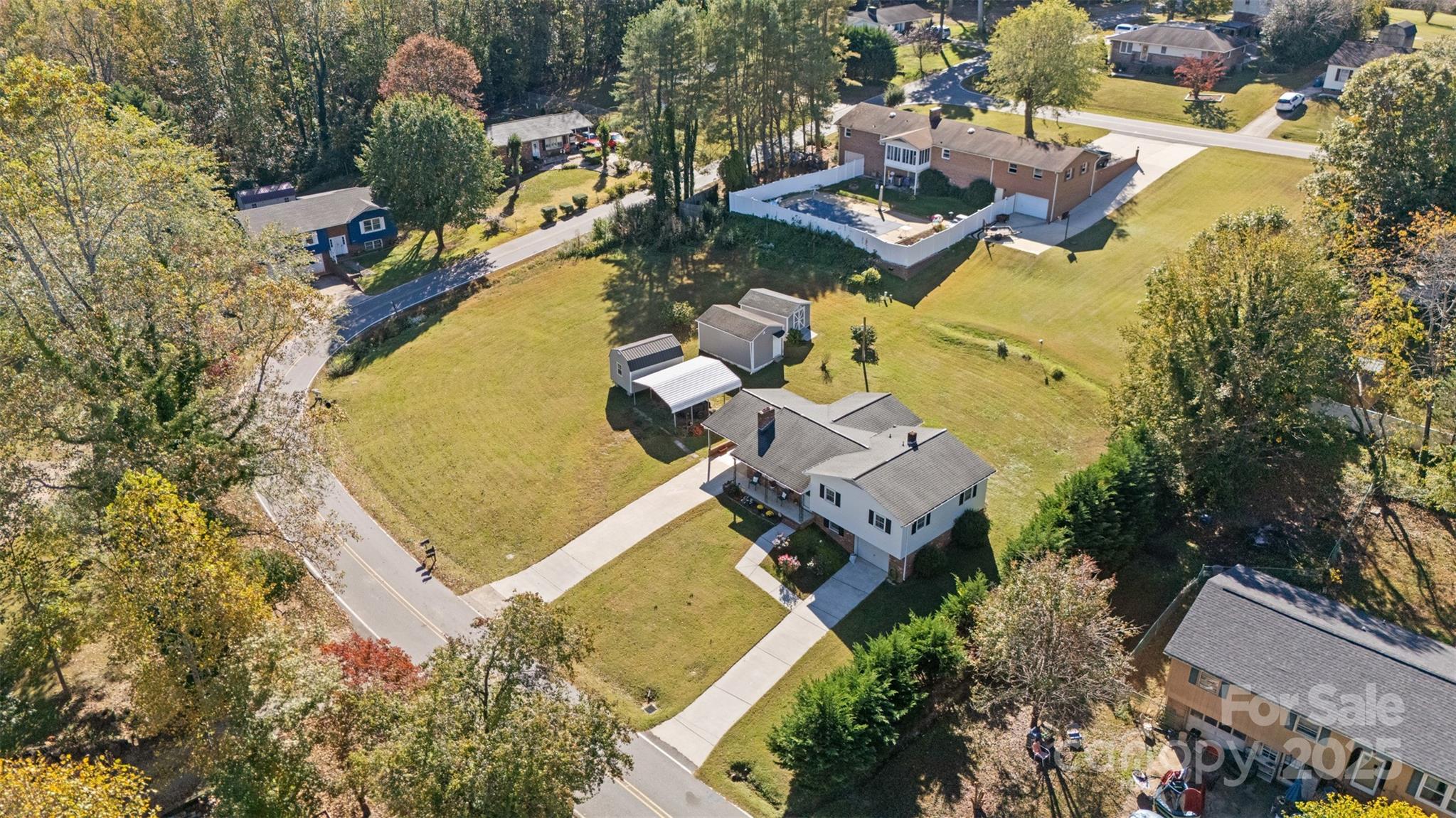 2598 Conner Circle Lenoir, NC 28645 - Photo 28 of 44 an aerial view of residential house with swimming pool