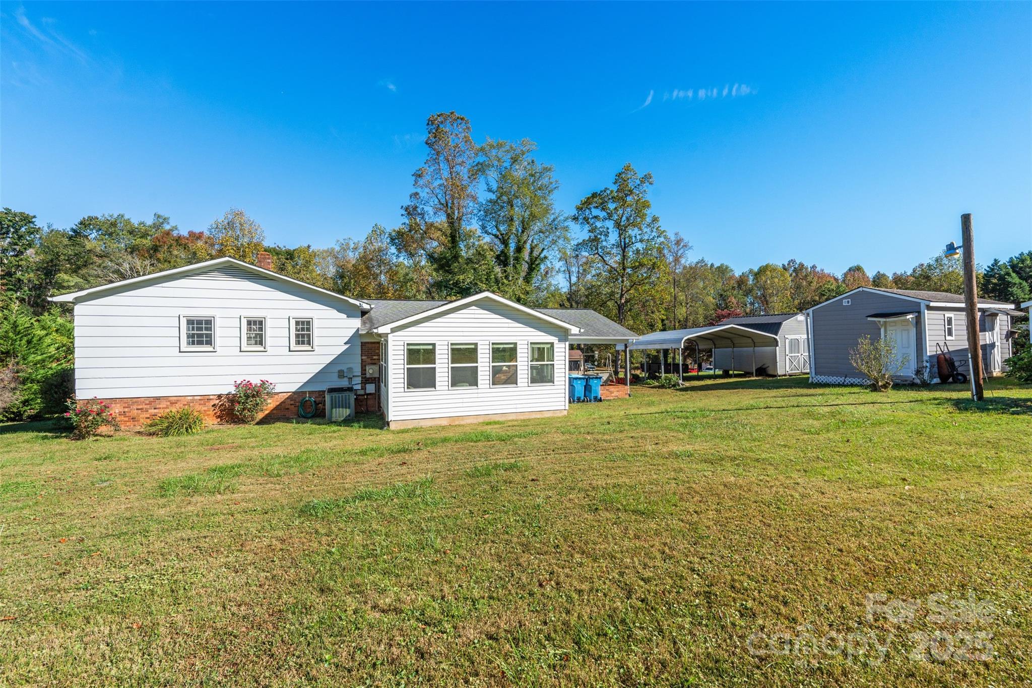 2598 Conner Circle Lenoir, NC 28645 - Photo 35 of 44 a front view of a house with a garden