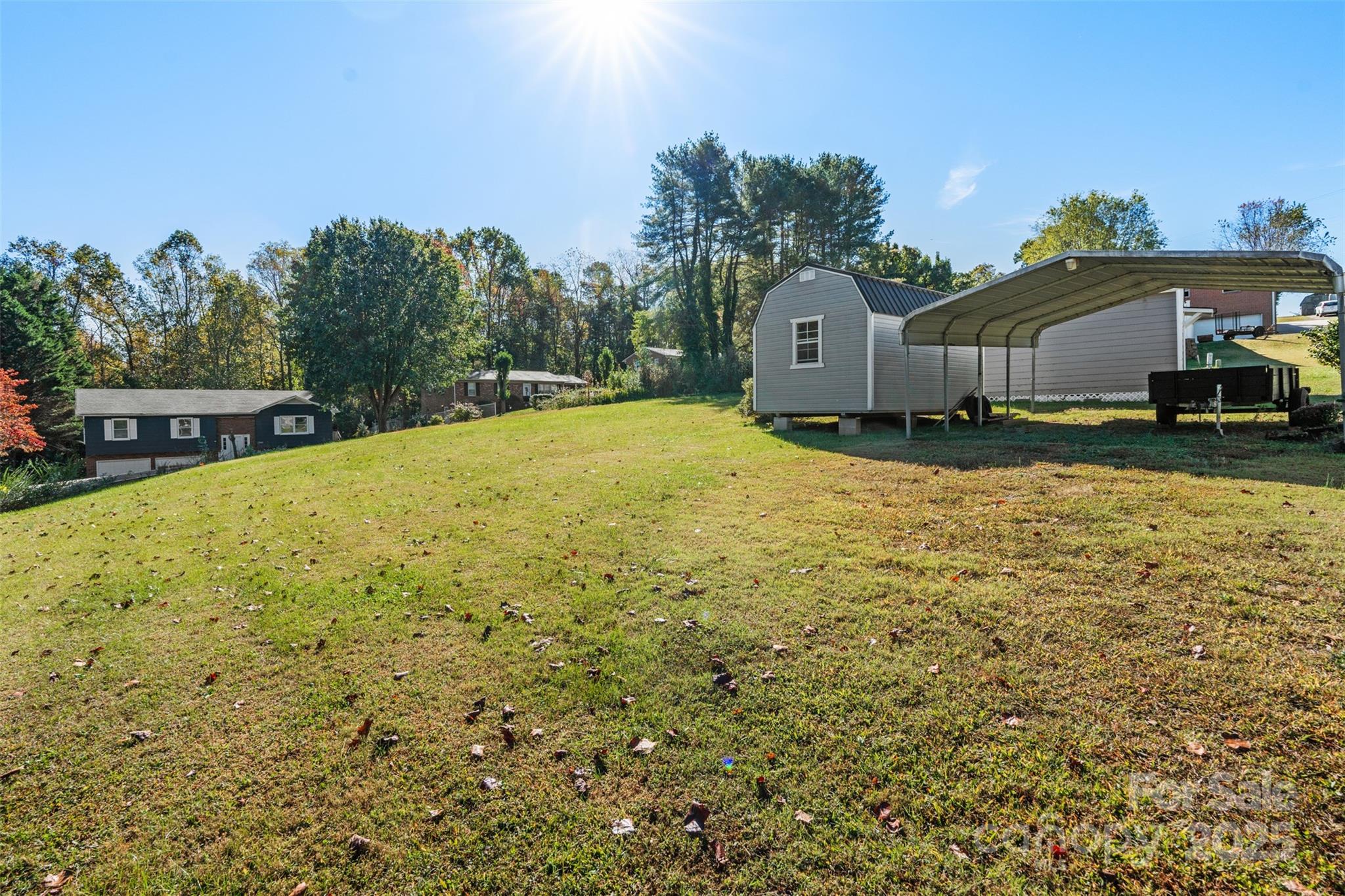 2598 Conner Circle Lenoir, NC 28645 - Photo 39 of 44 a swimming pool with outdoor seating and yard