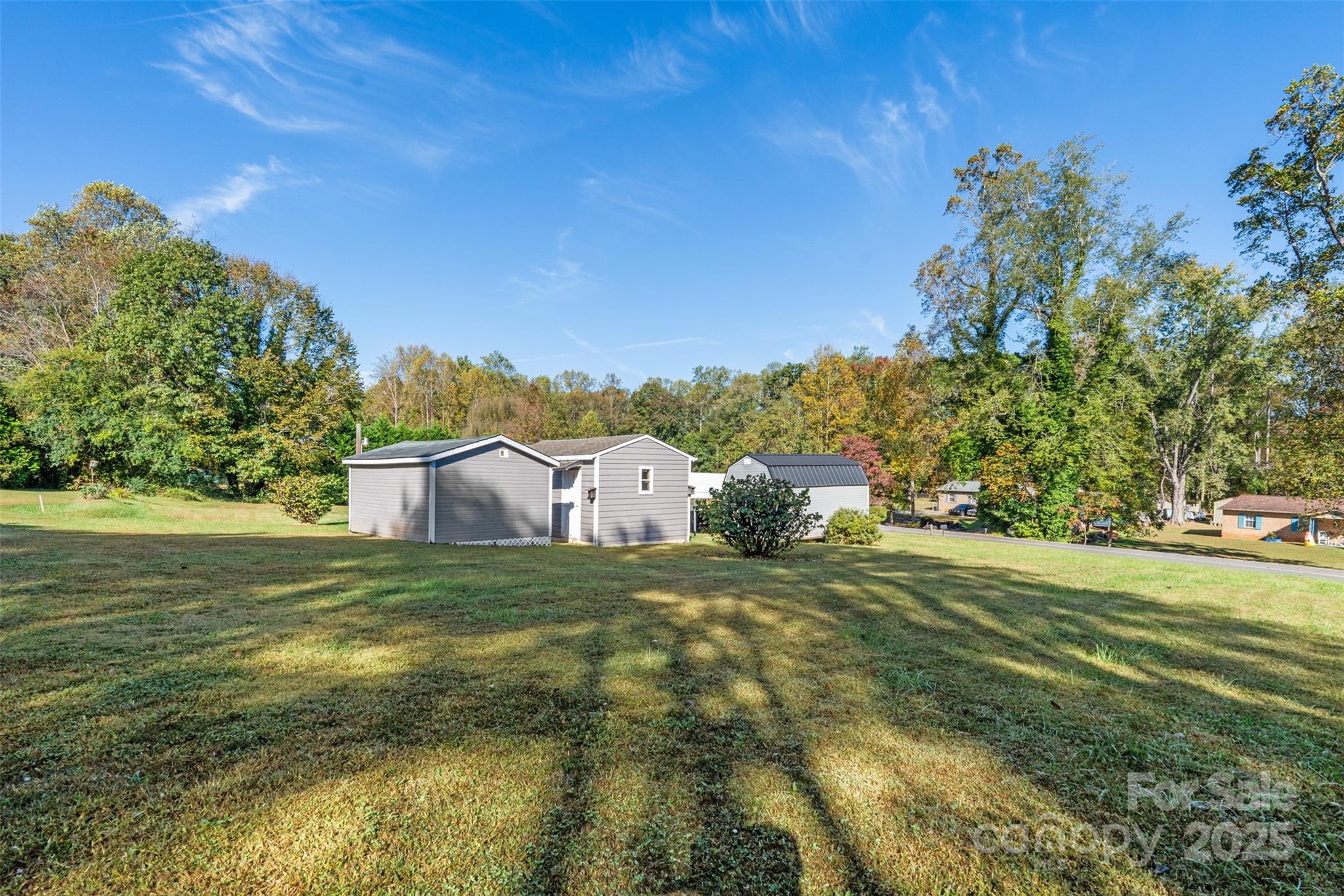 2598 Conner Circle Lenoir, NC 28645 - Photo 42 of 44 a view of a big yard with an trees