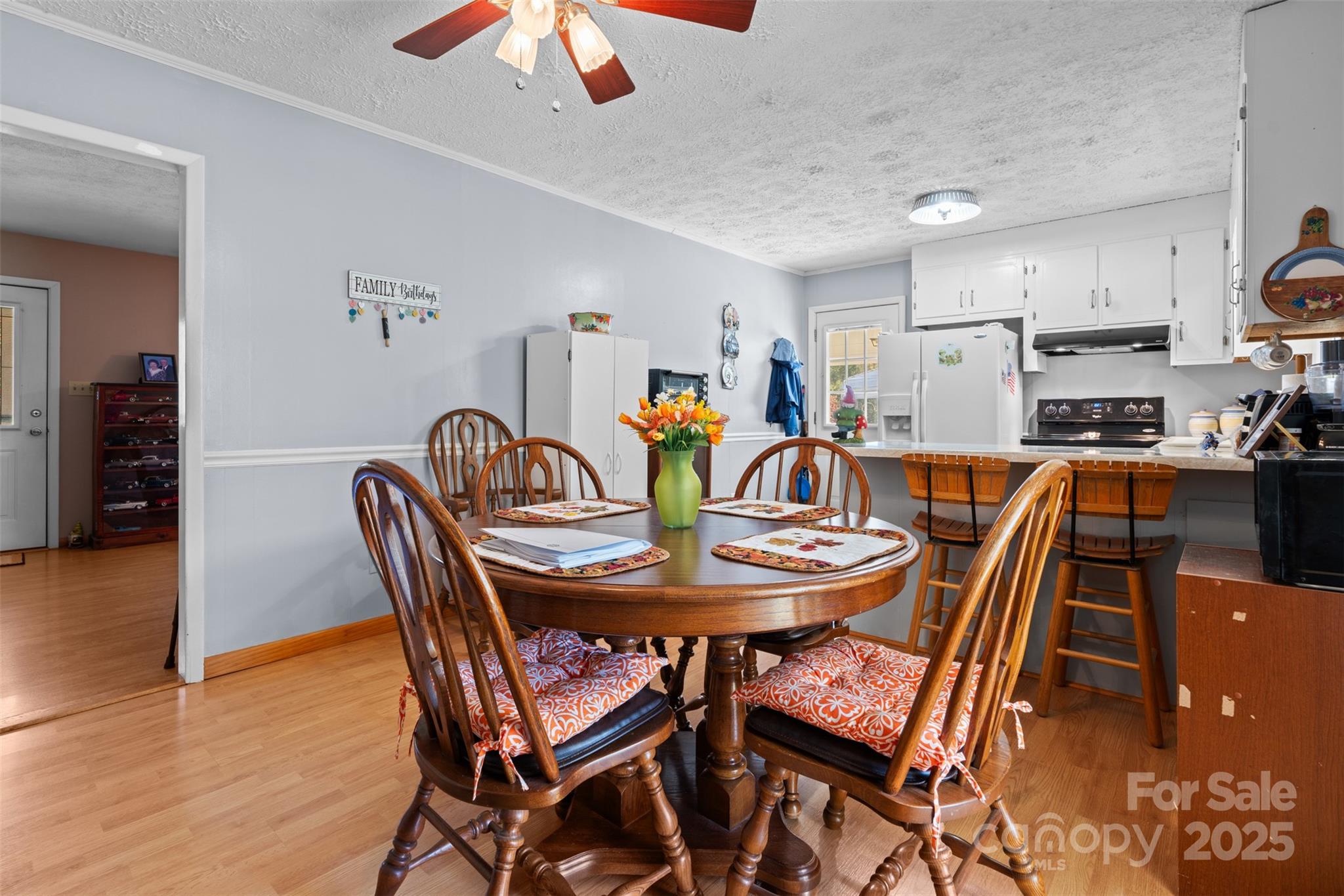 2598 Conner Circle Lenoir, NC 28645 - Photo 10 of 44 a dining room with furniture and wooden floor