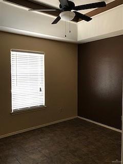 2213 West Candlelight Lane, Unit 4 Edinburg, TX 78541 - Photo 11 of 15 Unfurnished room with a ceiling fan and baseboards