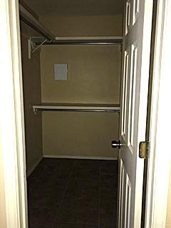 2213 West Candlelight Lane, Unit 4 Edinburg, TX 78541 - Photo 10 of 15 Spacious closet with tile patterned flooring