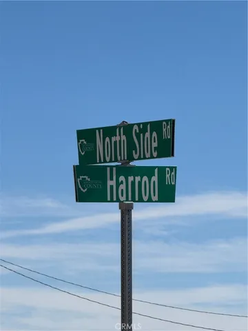a street sign on a pole on a street