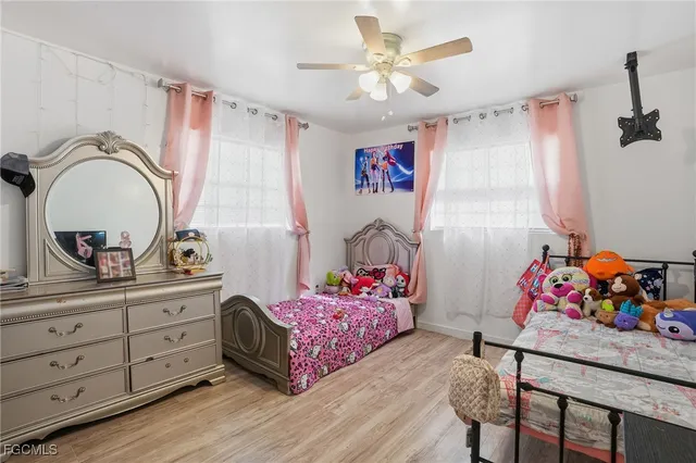 a bedroom with a bed and furniture