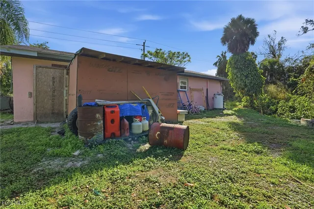 a front view of house with yard and seating area