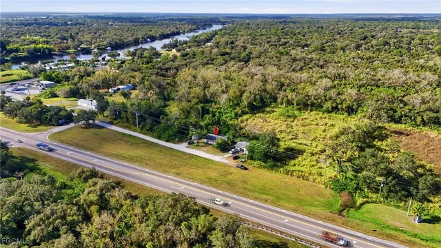 a view of a yard with an outdoor seating