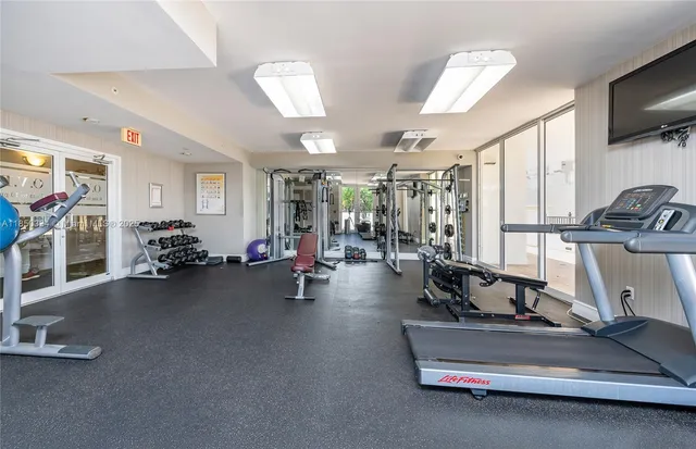 a view of a room with gym equipment