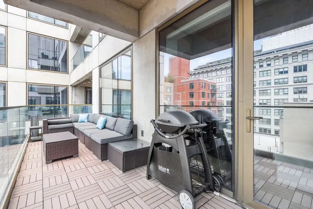 a picture of a room with a white wall and white kitchen