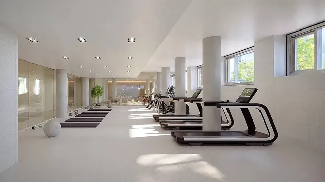 a view of a living room and kitchen