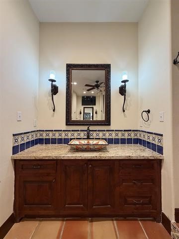 12410 Keith Road Beaumont, TX 77713 - Photo 26 of 45 a bathroom with a sink vanity and mirror