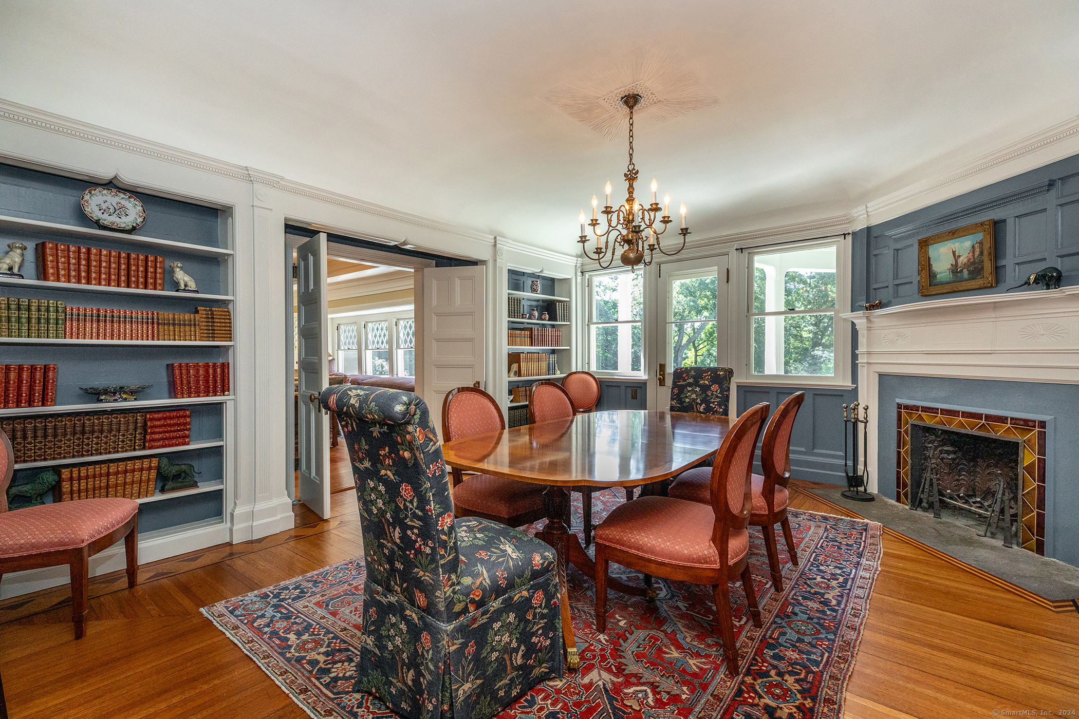 51 Ferry Bridge Road Washington, CT 06793 - Photo 11 of 36 a view of a dining room with furniture a rug and wooden floor