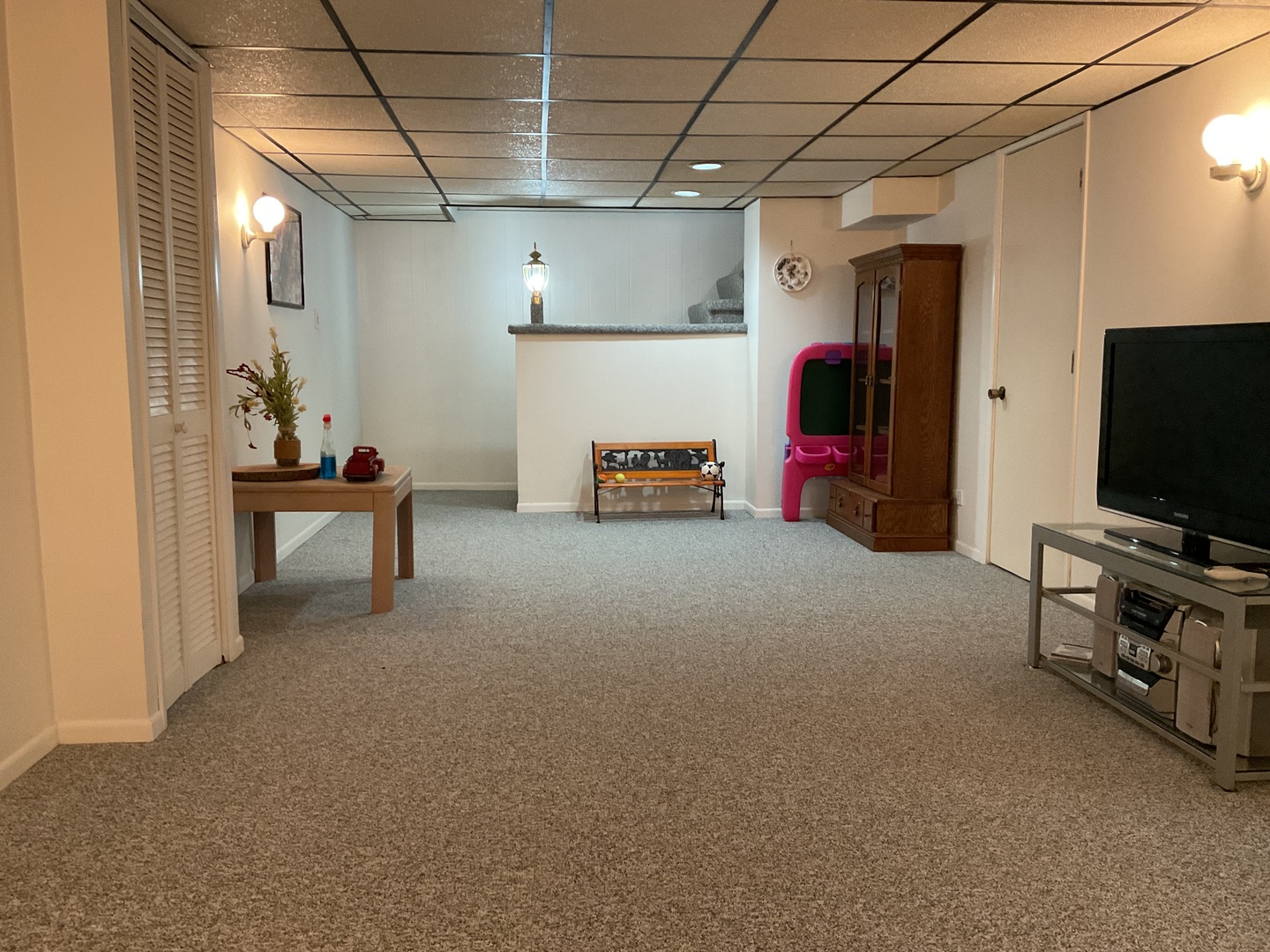 1200 West Palm Drive Mount Prospect, IL 60056 - Photo 34 of 36 a children room with furniture and a flat screen tv