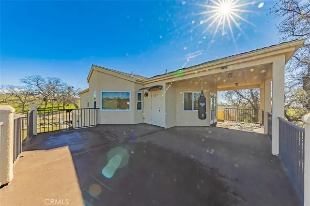 a view of an empty room and wooden floor