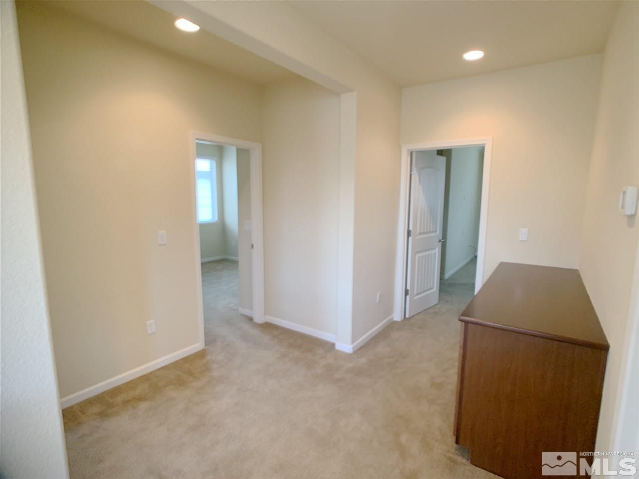 2160 Bears Ranch Drive Reno, NV 89521 - Photo 9 of 12 an empty room with closet and mirror