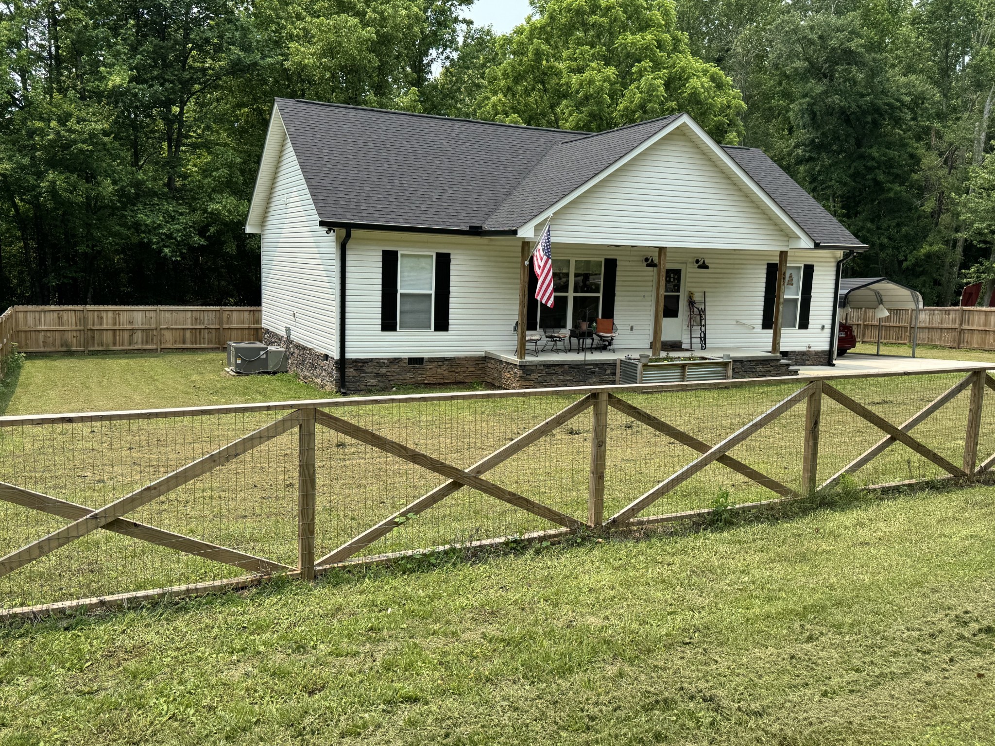 662 Ketner Mill Road Whitwell, TN 37397 - Photo 2 of 26 a view of a house with swimming pool and sitting area