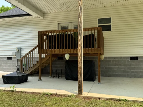 a view of balcony deck and furniture
