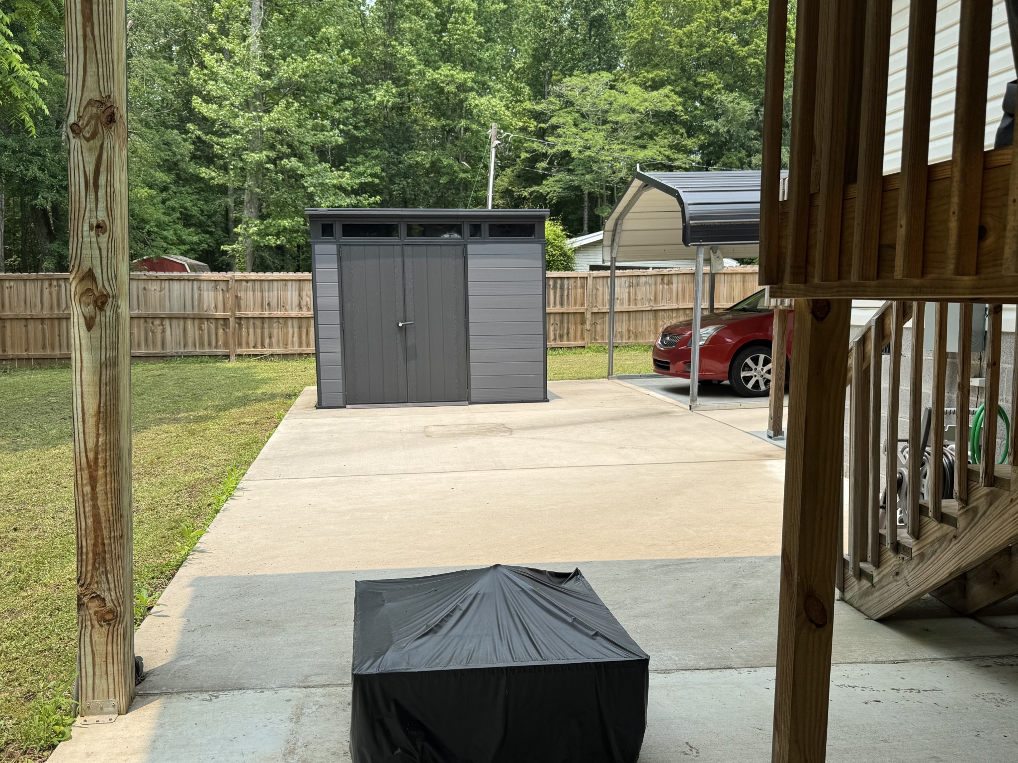 662 Ketner Mill Road Whitwell, TN 37397 - Photo 25 of 26 a view of backyard with small cabin and wooden fence