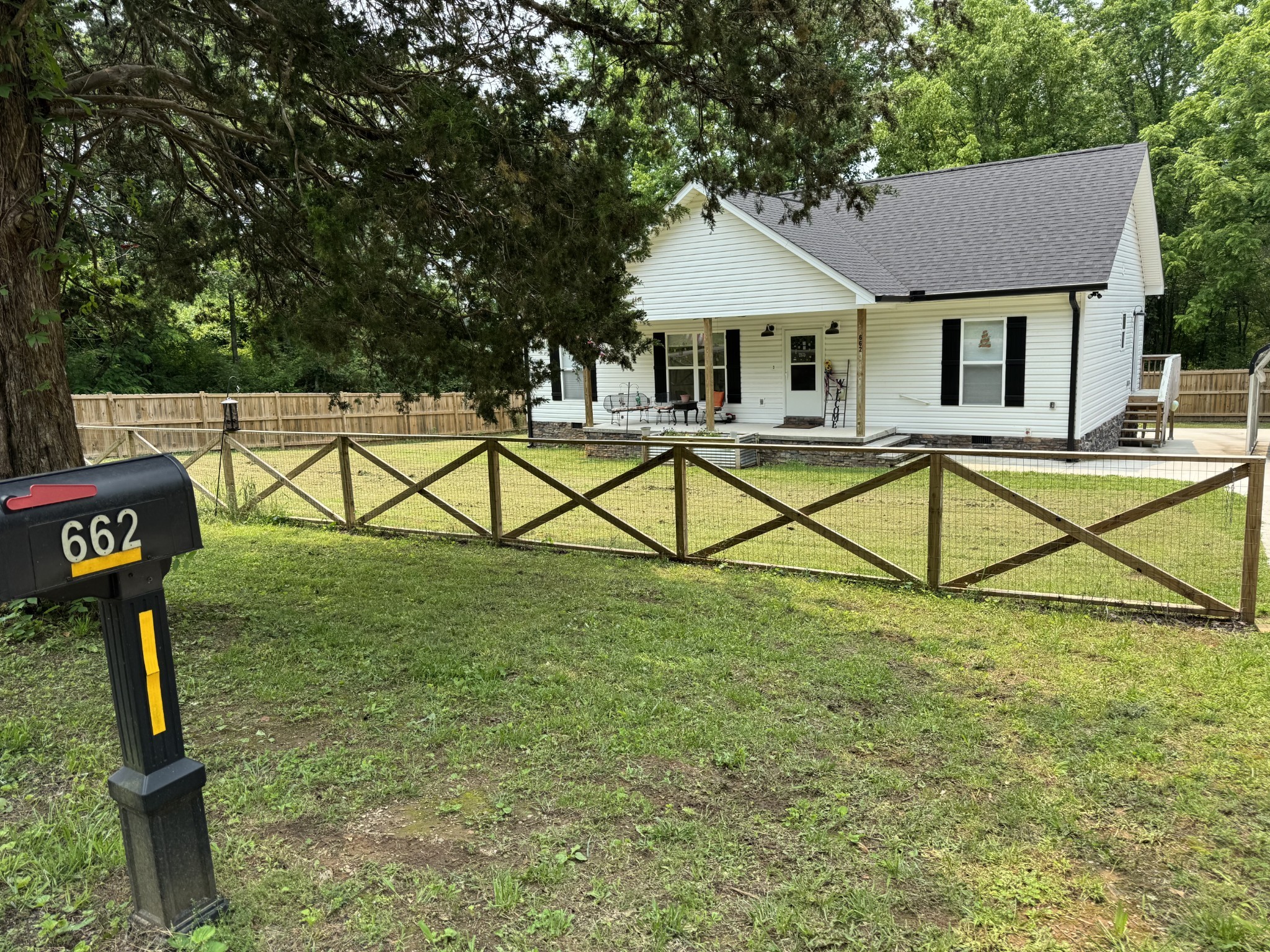 662 Ketner Mill Road Whitwell, TN 37397 - Photo 3 of 26 a house that has tree in front of it