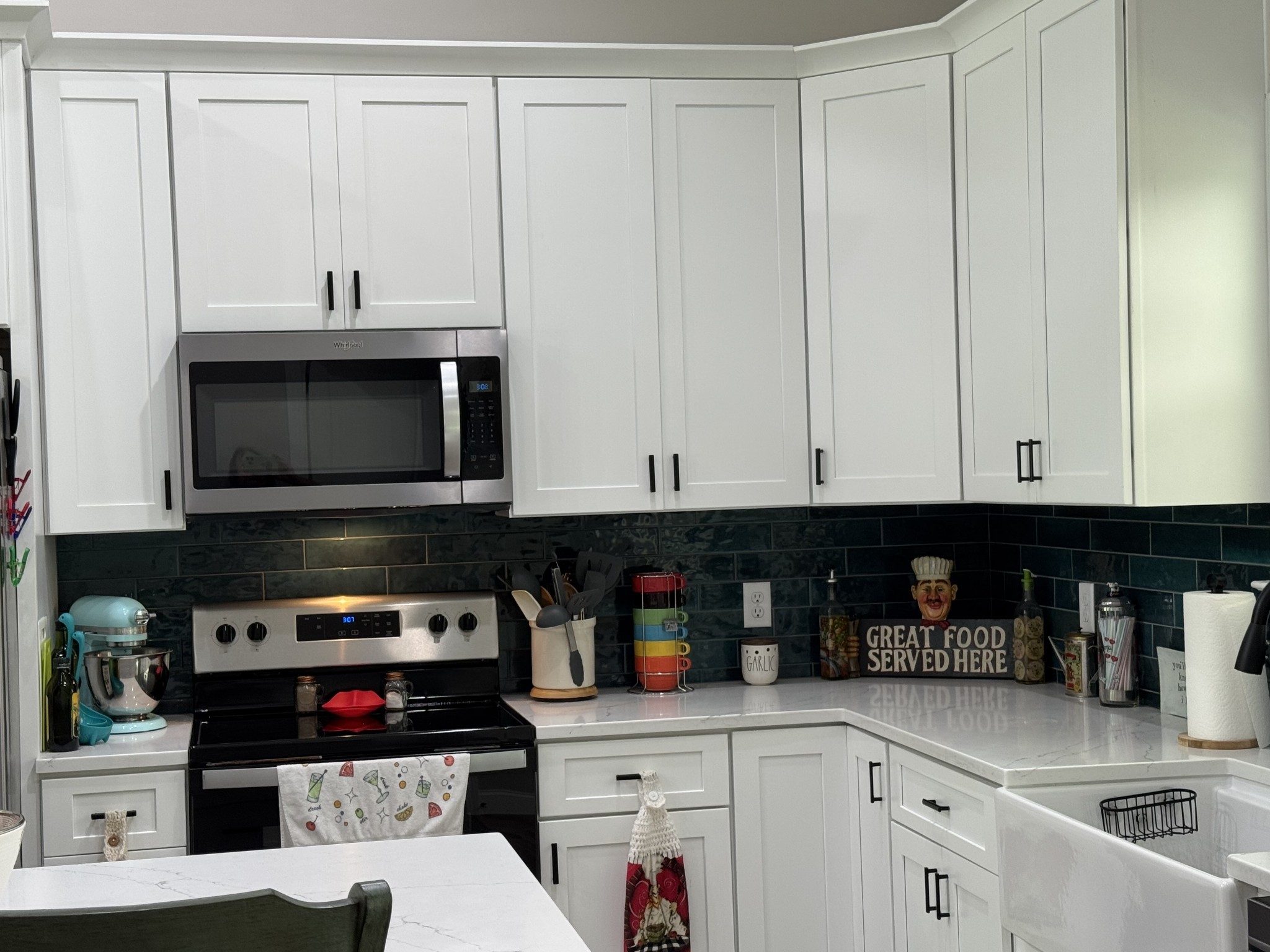 662 Ketner Mill Road Whitwell, TN 37397 - Photo 4 of 26 a kitchen with stainless steel appliances granite countertop a stove and a microwave