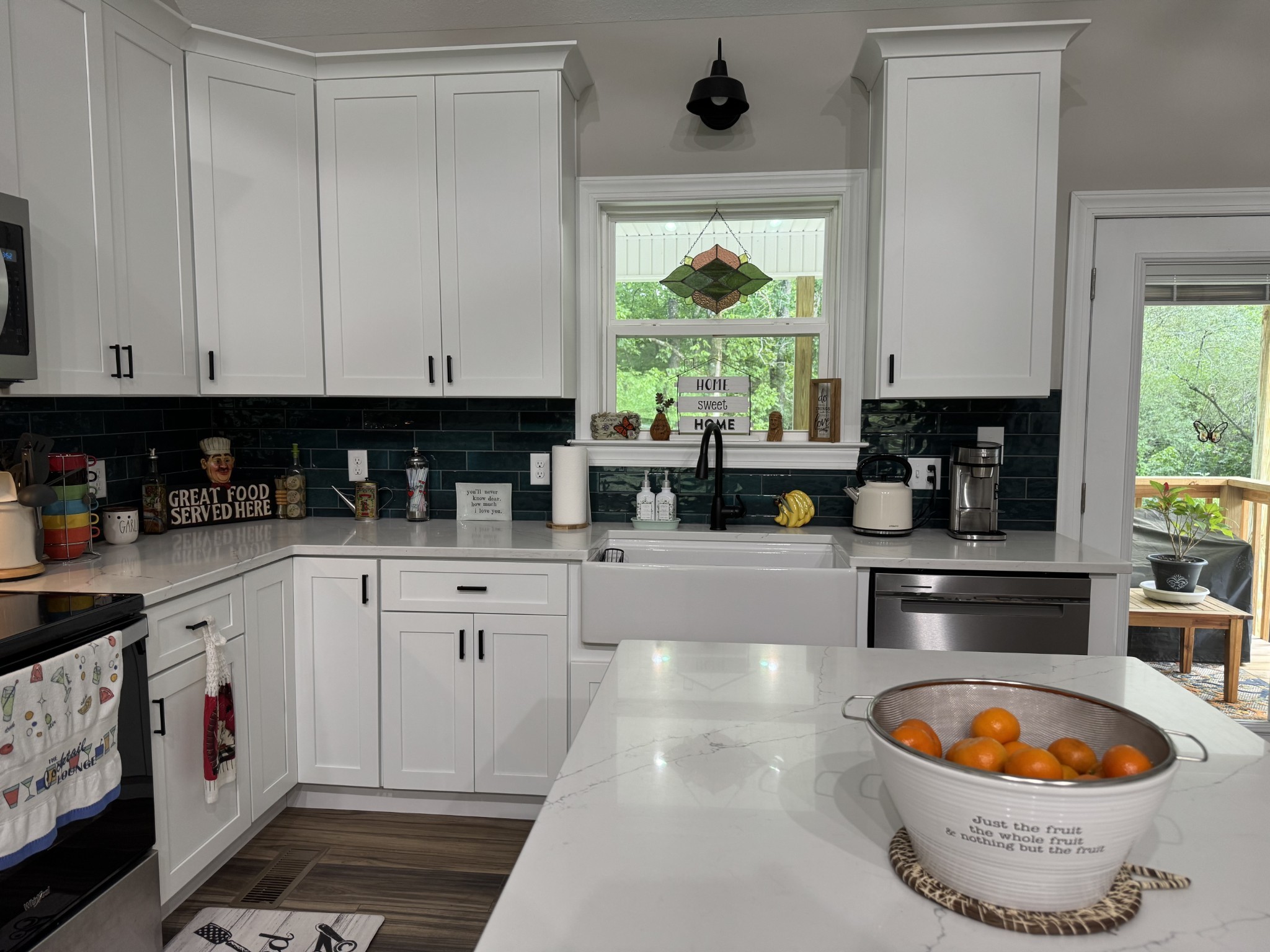 662 Ketner Mill Road Whitwell, TN 37397 - Photo 8 of 26 a kitchen with appliances a sink and a window