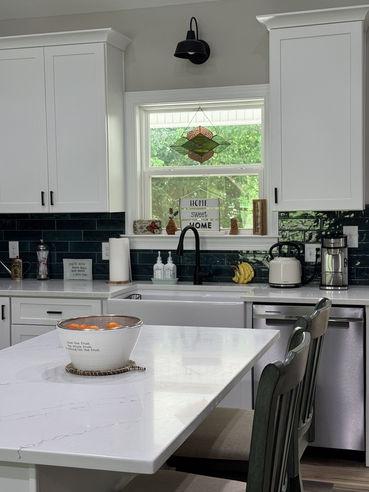 662 Ketner Mill Road Whitwell, TN 37397 - Photo 9 of 26 a kitchen with granite countertop a stove and white cabinets