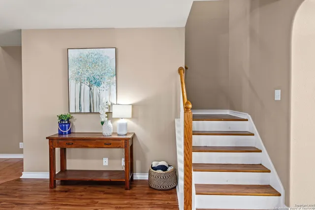 a view of hall way with mirror